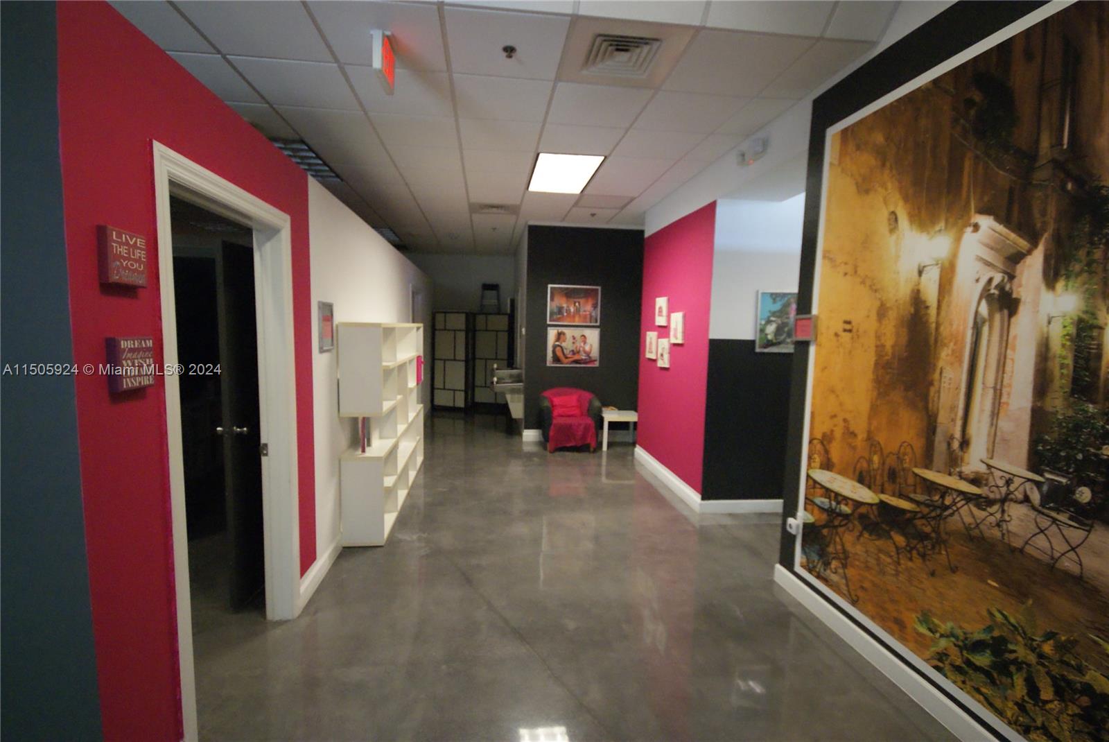 Hallway to separate rooms in D