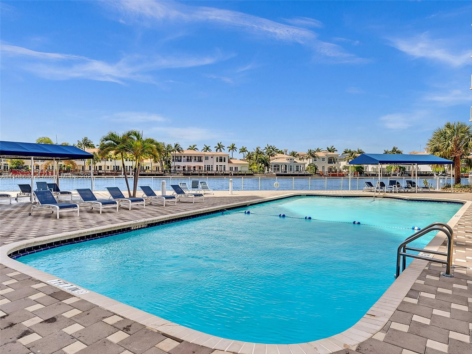 GORGEOUS RESORT STYLE POOL RIGHT ON THE WATER! SO RELAXING AND ALWAYS A BREEZE!