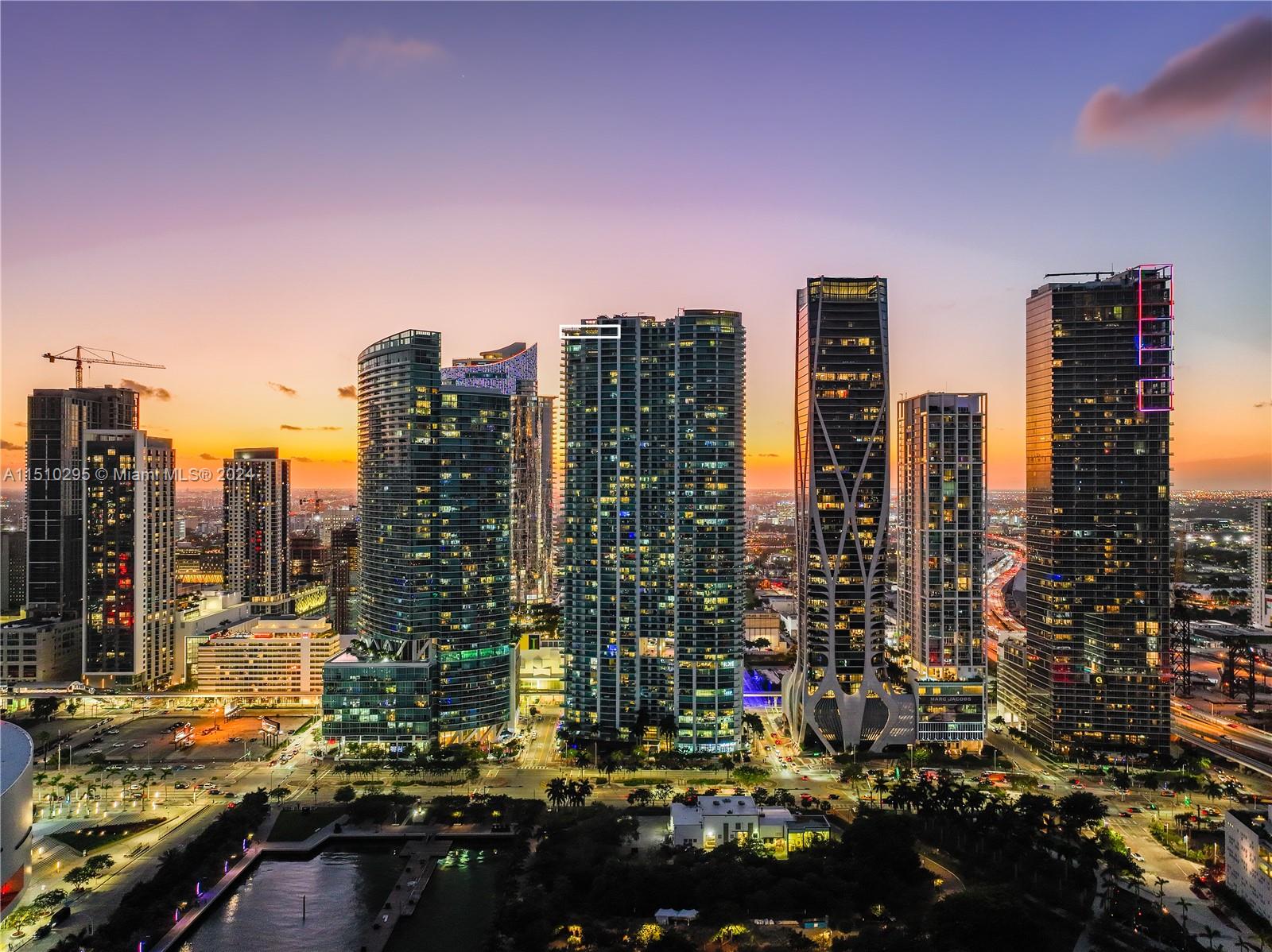 Elevate your living with this true Penthouse, offering unparalleled panoramic views of the bay, ocean, and city from every room. This exquisite 4-bed, 4.5-bath plus a maids quarter residence is an entertainer's dream, featuring a sprawling wrap-around terrace perfect for enjoying the breathtaking scenery. Located in the heart of Downtown Miami with upscale shops, and fine dining, Miami Arena, and Perez Art Museum. This high-rise offers top-notch amenities, such as multiple pools, a rejuvenating spa, a state-of-the-art fitness center, convenient grill stations, and even a theater for private screenings. Experience the pinnacle of elevated living in Downtown Miami. With just a short distance to South Beach and Miami International Airport, this is the epitome of sophisticated city living.