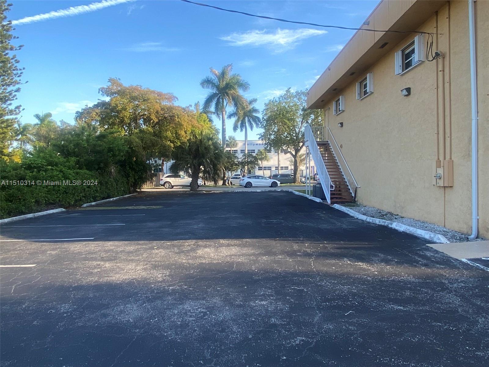 21 parking spaces with additional 5 spaces alongside building