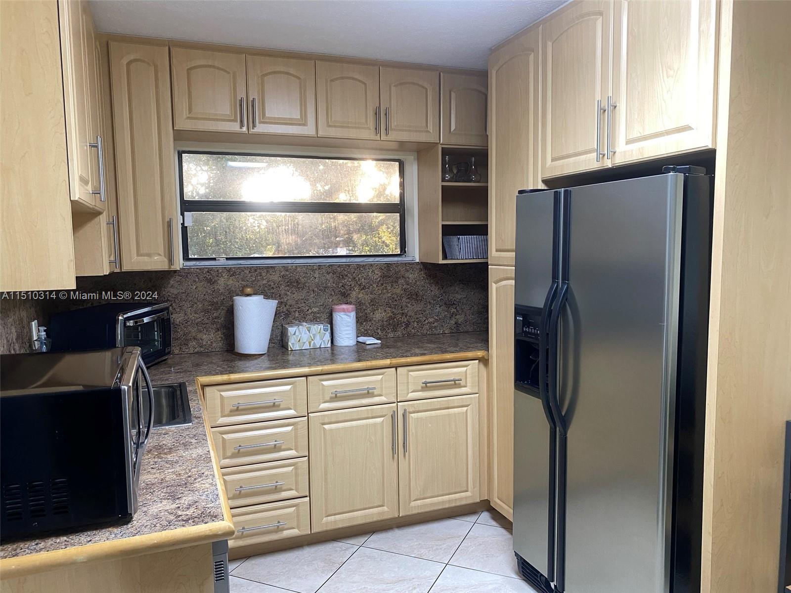 Kitchen w/Dish Washer & Refrigerator