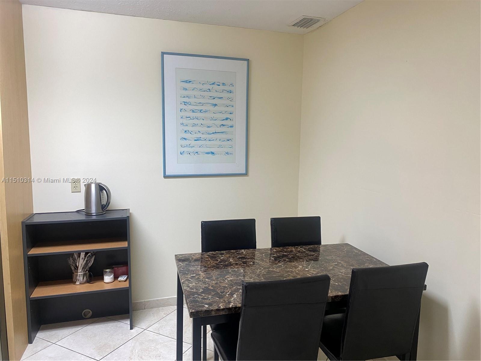 Staff meal break area with table