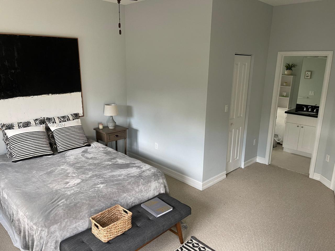 Overview of bedroom #2 with access to walk in closet and ensuite bathroom.
