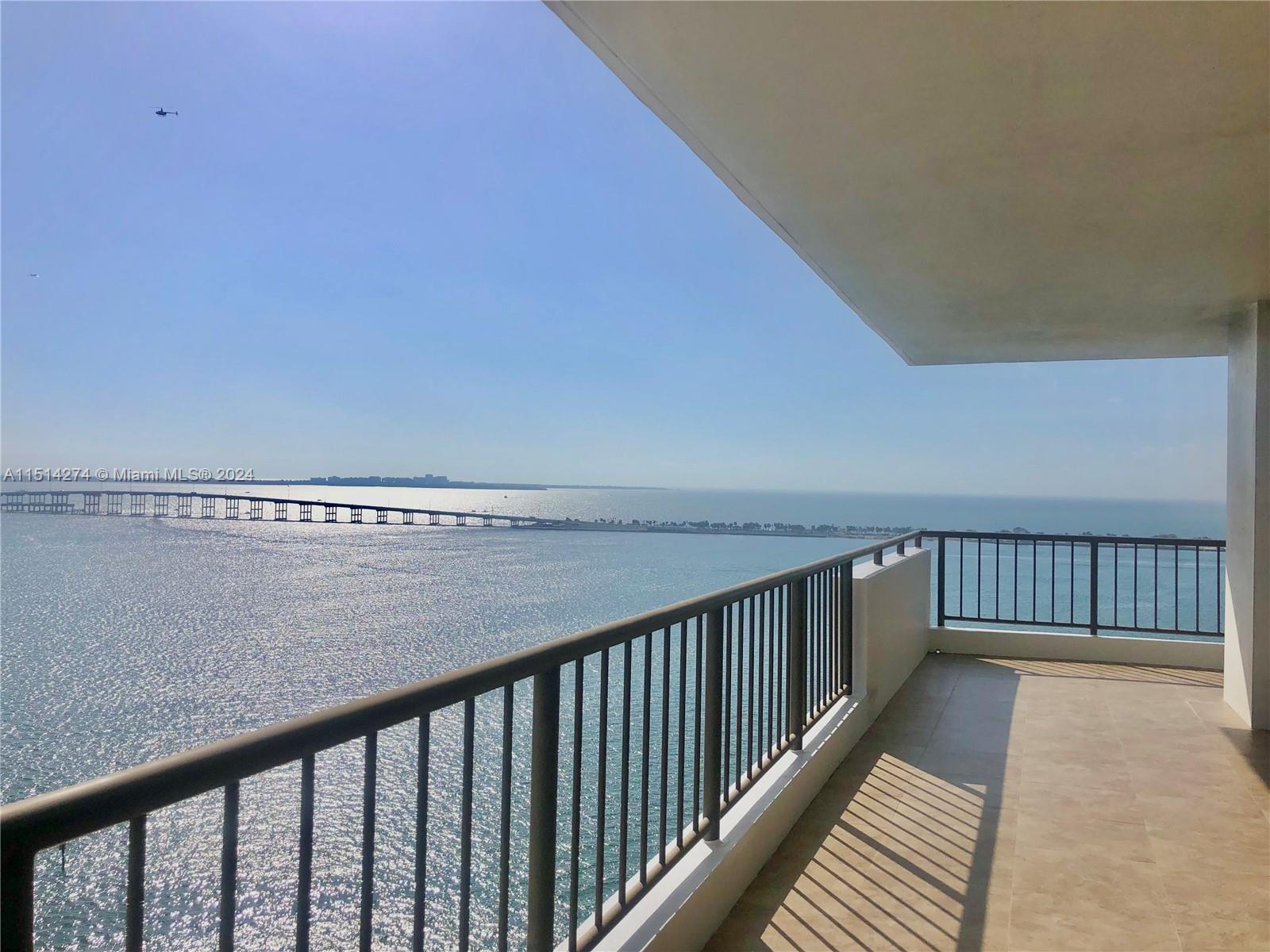 Desirable 01 line in Villa Regina East Tower, only 3 units per floor. Entire unit features wrap-around terrace with unobstructed views of Biscayne Bay and Ocean. Completely remodeled in 2010 with top of the line gourmet kitchen appliances, tile floors throughout, cedar walking closets, impact hurricane resistance windows, electric window treatments, costume doors and many more unique features throughout. Please see broker's remarks for showings.
