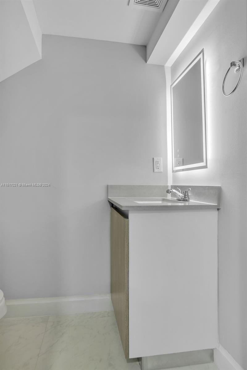 1/2 BATH DOWNSTAIRS
