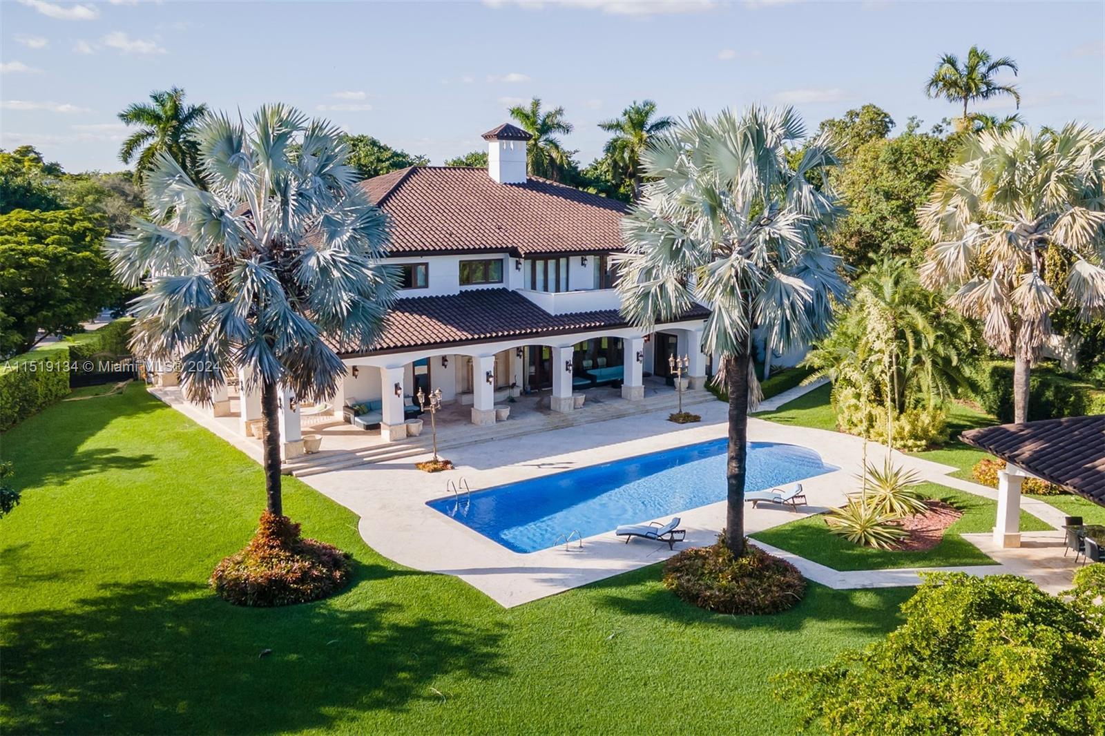 Discover luxury living in this 14,461 Sq.Ft Mediterranean trophy masterpiece by Ramon Pacheco on Old Cutler Road. A developer-user bunker, this 7-bed/11-bath estate on over an acre is FEMA Floodzone X, ensuring safety. Grand ceilings lead to a beautiful bar, sprawling office, an air-conditioned 4-car garage, and a master suite the size of a small house, with a balcony overlooking the resort-style backyard boasting a pool fit for a hotel. Full service custom summer kitchen, extensive buildouts throughout, wine cellar, truly one of a kind.