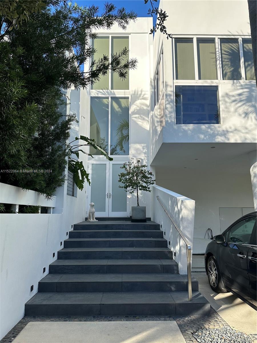 RARE OPPORTUNITY TO PURCHASE THIS CLASSICALLY MODERN CUSTOM HOME DESIGNED BY RENOWNED MIAMI ARCHITECT ALLAN SHULMAN. THIS TIMELESS BEAUTY OF A HOME WAS BUILT IN 2010 AND IT HAS LIGHT FILLED ROOMS OPENING OUT TO PATIOS.  OVER 5000 SQ FT, 4 BEDROOMS, DEN/5TH BEDROOM AND A 50' LIVING AREA LEADING OUT TO A GARDEN OASIS, OVERLOOKING THE SERENE POOL AREA. A PERFECT CHEF'S KITCHEN MADE FOR ENTERTAINING AND ENJOYING. GARAGE, FULL SIZED LAUNDRY ROOM, GAMES ROOM AND MUCH MORE. A MUST SEE