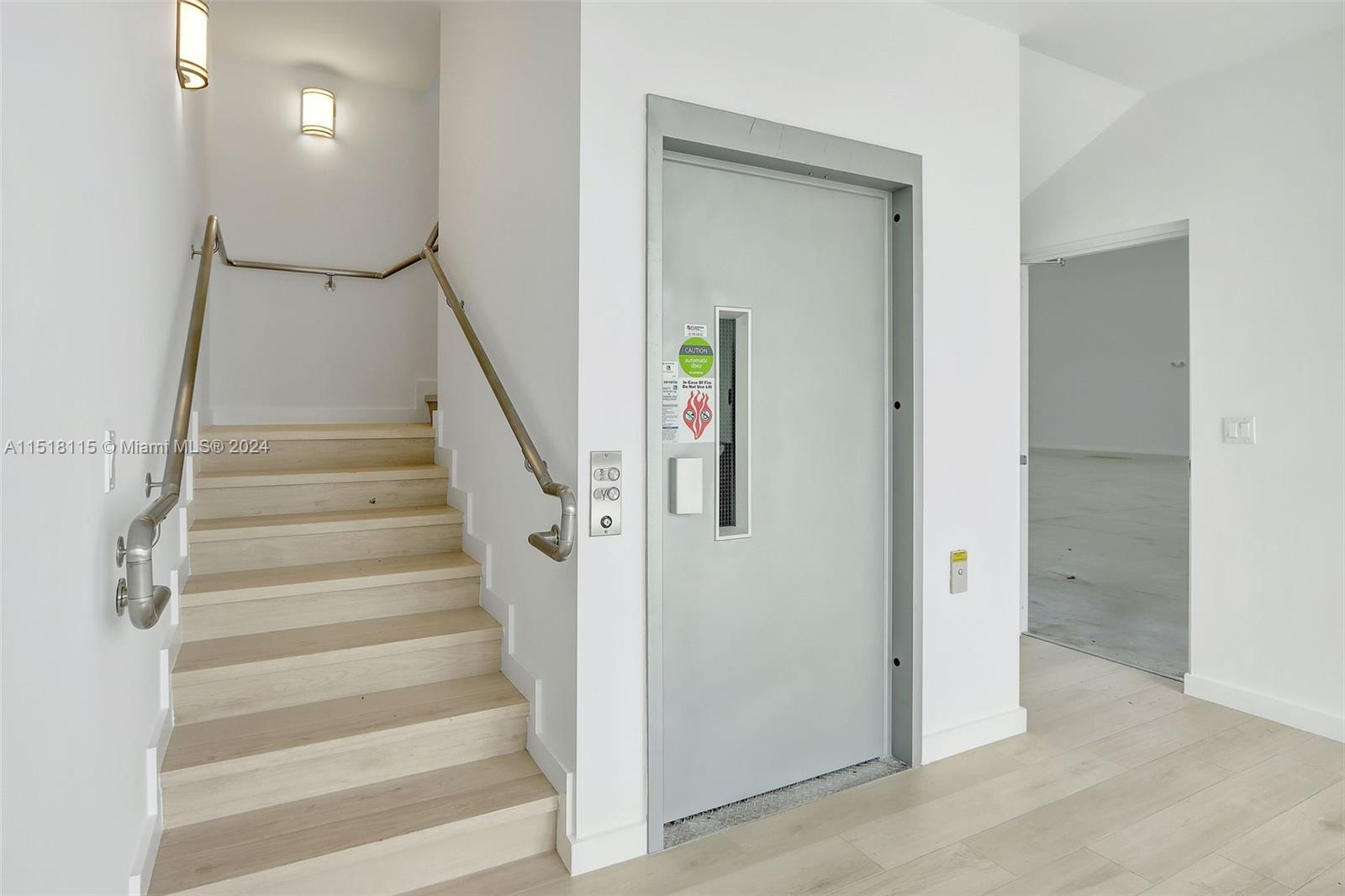Stairwell and elevator to upstairs office