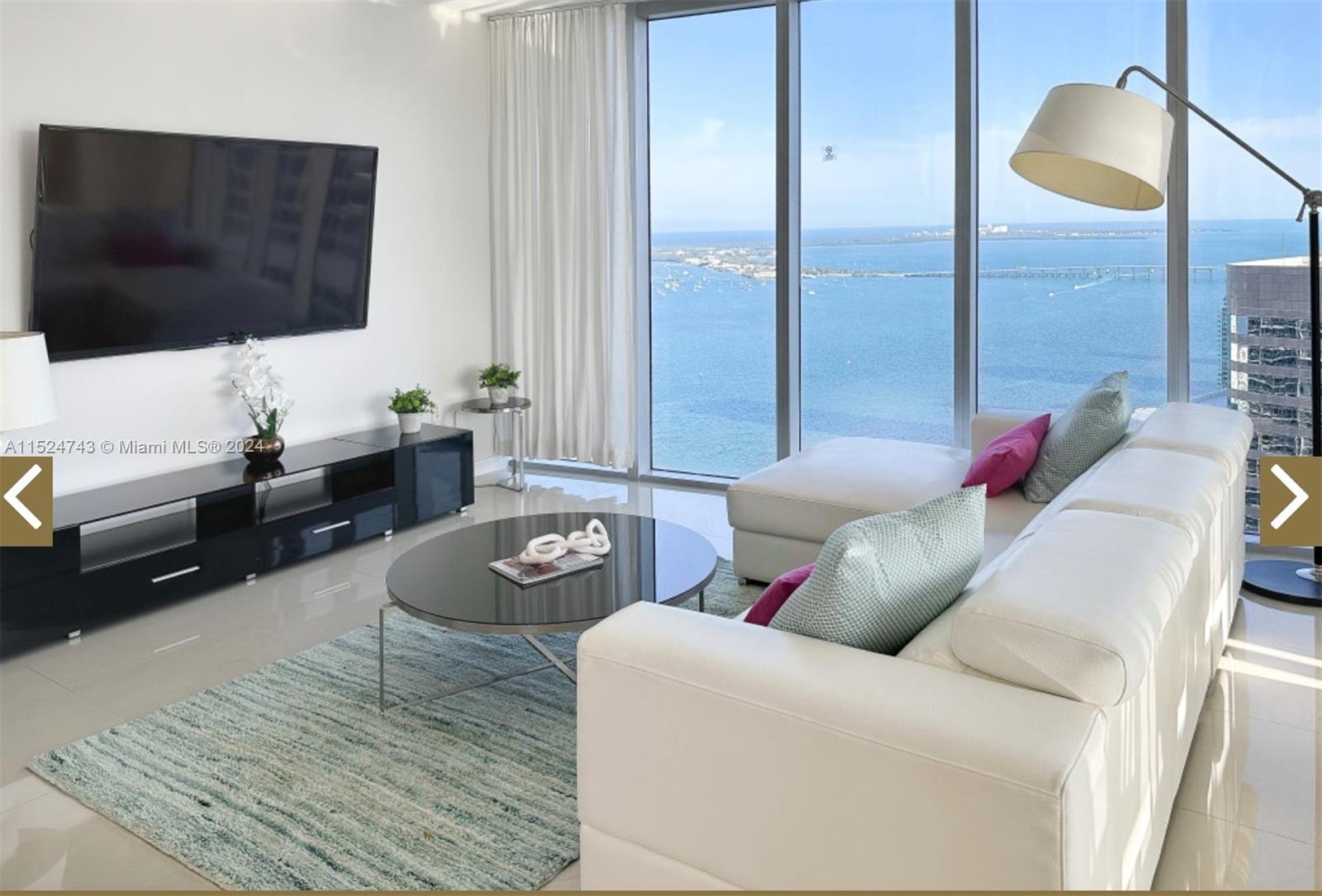 Prestigious corner unit in the best line of airbnb Icon Brickell Tower 3. Enjoy breathtaking views of the Biscayne Bay, Miami River and Brickell/Downtown Skyline from floor to ceiling windows. Unit has been professionally styled by high end designer and is ready to move in with your suitcase. Perfect PIED-À-TERRE in Miami that can generate  airbnb come while you are away. Superb airbnb management in place. Italian kitchen, Subzero Wolf Bosh stainless appliances, Designed by Philippe Stark, world class amenities, famous 28000 sqft SPA Fitness Center with thermal hot tub, steam room, olympic size Infinity Pool overlooking Biscayne Bay, outdoor fireplace, movie theater, lushly landscaping and outdoor living. Fine dining with Cipriani & LaVeinte in the building. In the heart of Brickell.