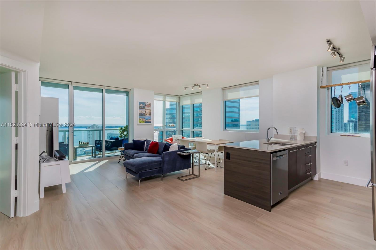 Rare, 2 Bedroom, 2 Bathroom, Southeast Corner Unit on Brickell Avenue overlooking Biscayne Bay and the Atlantic Ocean.  This spacious apartment features lots of windows and natural light, and a large, private terrace which stretches the full width of the apartment and offers stunning water views as far as the eye can see.  Enjoy new floors, new appliances.  Amenities include Two Rooftop Pools, including our 42nd rooftop pool which features panoramic views of the Bay & Ocean, His and Hers Spas, Fitness Center, Media Room, Community Room, Assigned Parking in the Gated Parking Garage + Valet, 24/7 Security and Front Desk.  Walk to Brickell's top Dining, Shopping and Nightlife, including the Brickell City Center, Sexy Fish, and Zuma.  15 minutes to the beach and airport.