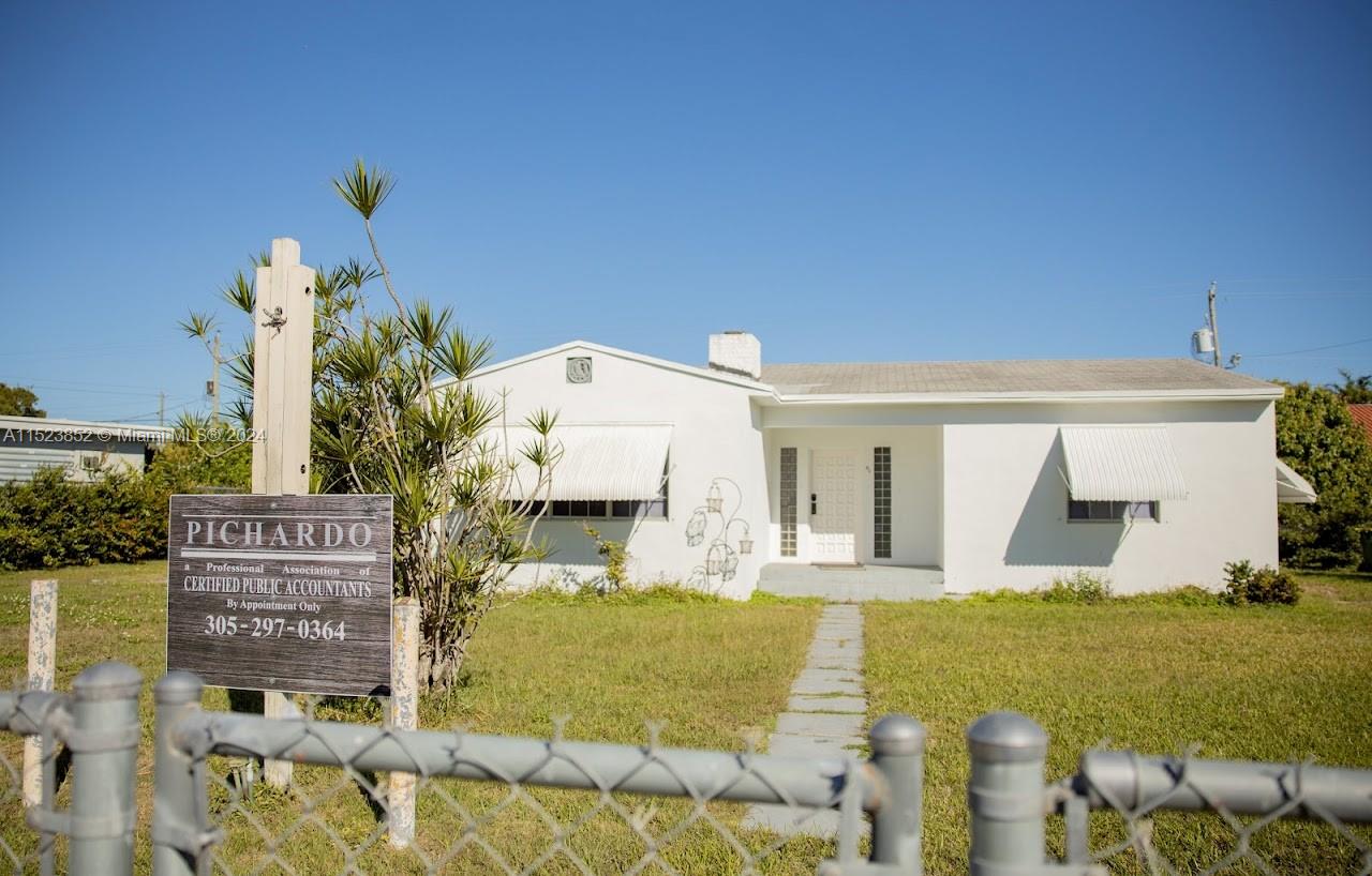 Fenced yard.  Zoned B1A for light business such as attorney, accountant, medical, etc.  1150 adjusted square feet. Property is located just off of Krome Avenue on NW 14 Street.