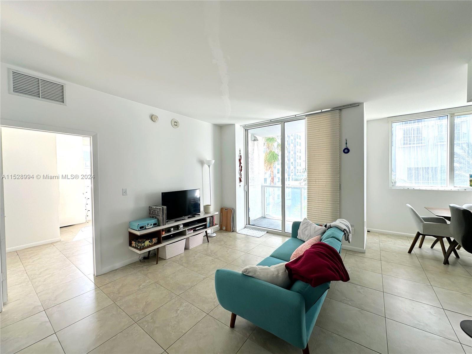 Corner Unit in the Heart of Downtown Miami! Spacious 1 BR + Converted Den/ 2 Full Baths.(approximately (1,146 sq ft) The den converted to a second bedroom. The kitchen has high-end Stainless Steel appliances & marble countertops. 2 Full bathrooms with marble floors, showers & glass doors. Ample walk-in closet. Full-size washer & dryer. Unit comes with 1 parking space and 1 storage unit. The condo offers 5-star resort-style amenities; 4 tropical pools, a jacuzzi, spa, gym & 24-hour lobby receptionists, and security.
