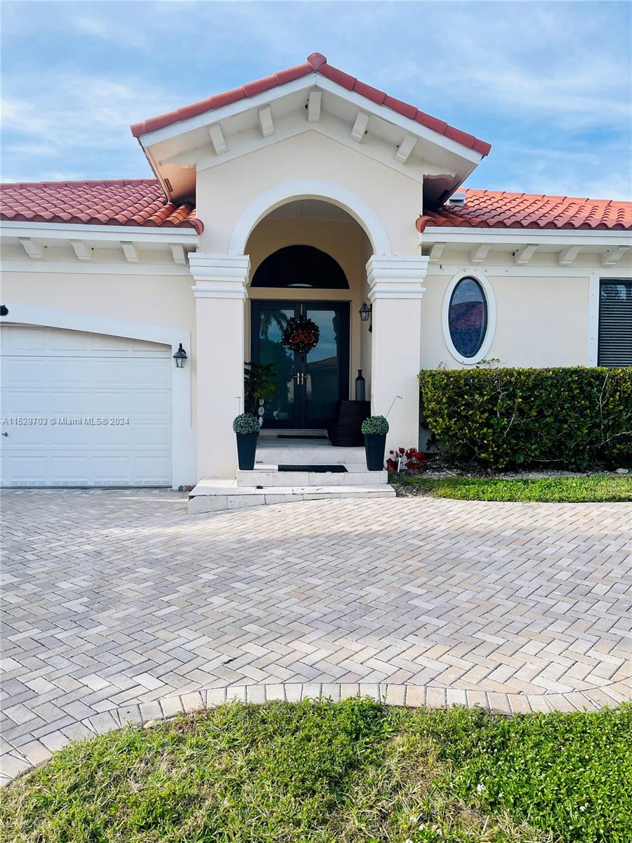 Very Nice and very well kept home in the exclusive gated community of Cutler Cay, spacious high ceilings with high impact windows and doors trough-out the entire house. New roof and big back yard with enough room for a pool. Lots of amenities in the community like Tennis, full Gym, olympic pool, sauna and much more. The association fee includes Internet, Cable and security alarm.