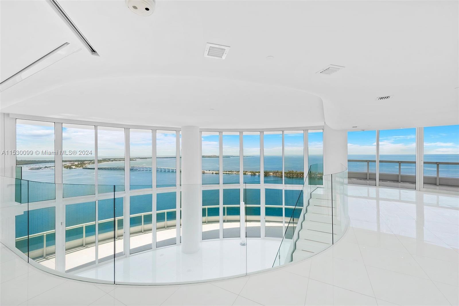 Breathtaking unobstructed views of the Bay and Ocean greet you as you step into this dramatic 2 story Townhouse on the 39th and 40th floors. 5,730 sq ft interiors were totally redesigned by a renowned architect and feature contemporary sleek finishes such as white glass 36&quot;x36&quot; flooring throughout, customized bathrooms, walk-in closets, designer doors, soffits and fixtures, motorized shades. An open kitchen with sliding frosted glass doors that open up to the spacious living room with 20 ft ceilings and a sweeping staircase. Architectural details and refined craftsmanship convey a sense of elegance and glamour coupled with unsurpassed relaxation. Santa Maria offers 5 star amenities, a fitness center, restaurant, heated pool, lighted tennis court, marina access and 24 hour security.