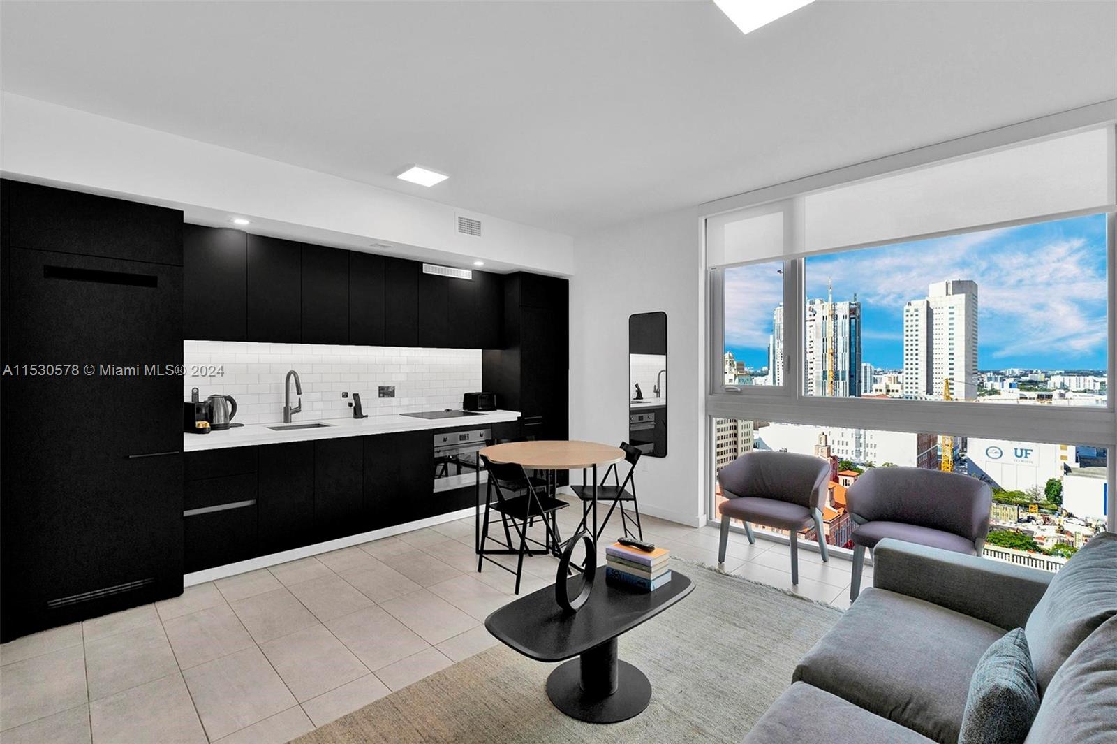 A beautiful, fully furnished, turnkey 2-bedroom unit located in the heart of Downtown Miami. It boasts modern decor and stunning views of downtown Miami. NO rental restrictions!!! Great opportunity for investors. The location is excellent, just one block from Bayfront Park and directly across from the First Street Metromover station. The building is a high-rise with fantastic amenities, including a beautiful swimming pool, gym, restaurant, bars, rooftop residence lounge, etc. Valet parking and 24/7 security. Come to see it now!