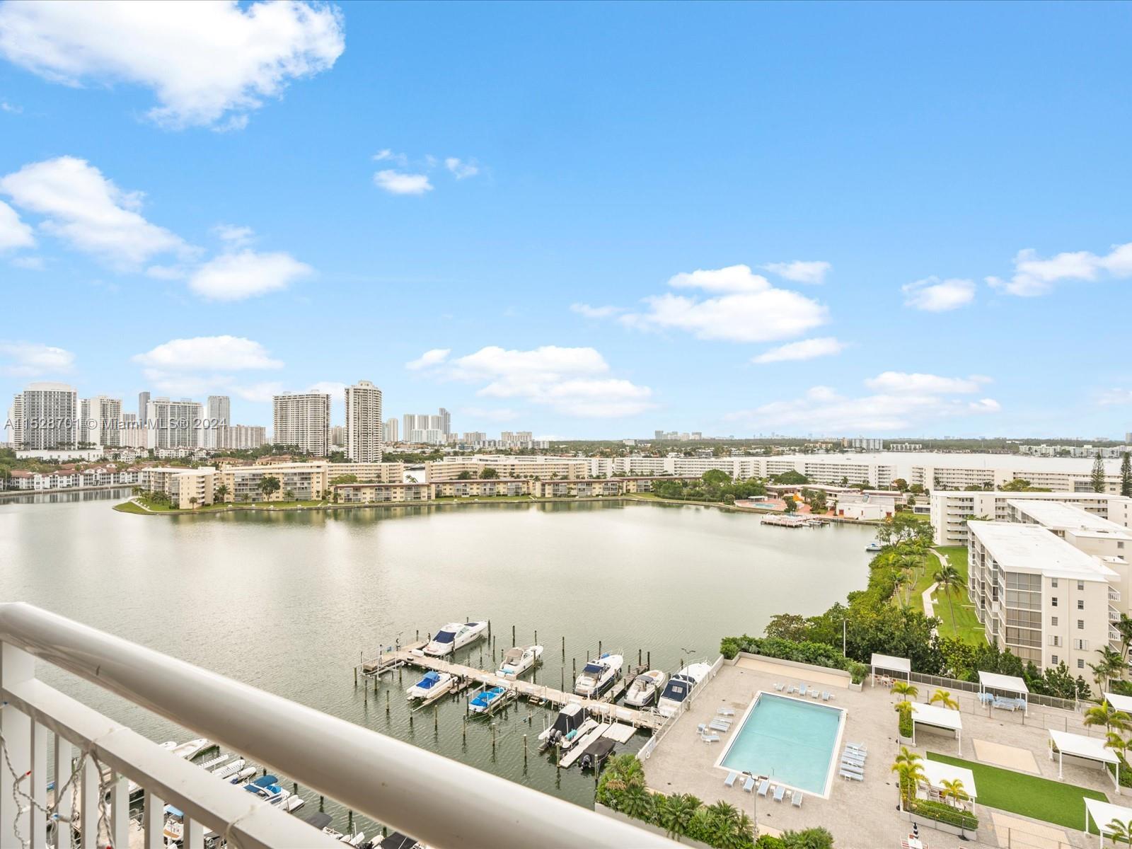 Stunning LARGEST UNIT IN THE BUILDING!!  4-bed, 3-bath, 3 balconies waterfront condo in Aventura. Boasting 2387 Sq. Ft. of refined living space, it features unique upgrades throughout. The layout includes a spacious living room, a high-end open kitchen, four large bedrooms, three modern bathrooms, and ample closet space. Three private balconies offer stunning N & S views, inviting relaxation and enjoyment of the surroundings. Enjoy resort-style living with amenities such as a tennis court, state-of-the-art gym, private marina, and two swimming pools. Nestled in the heart of Aventura, it offers convenience with shops like Fresh Market and dining options nearby—minutes from Sunny Isles Beach, Aventura Mall, highways, and esteemed schools.