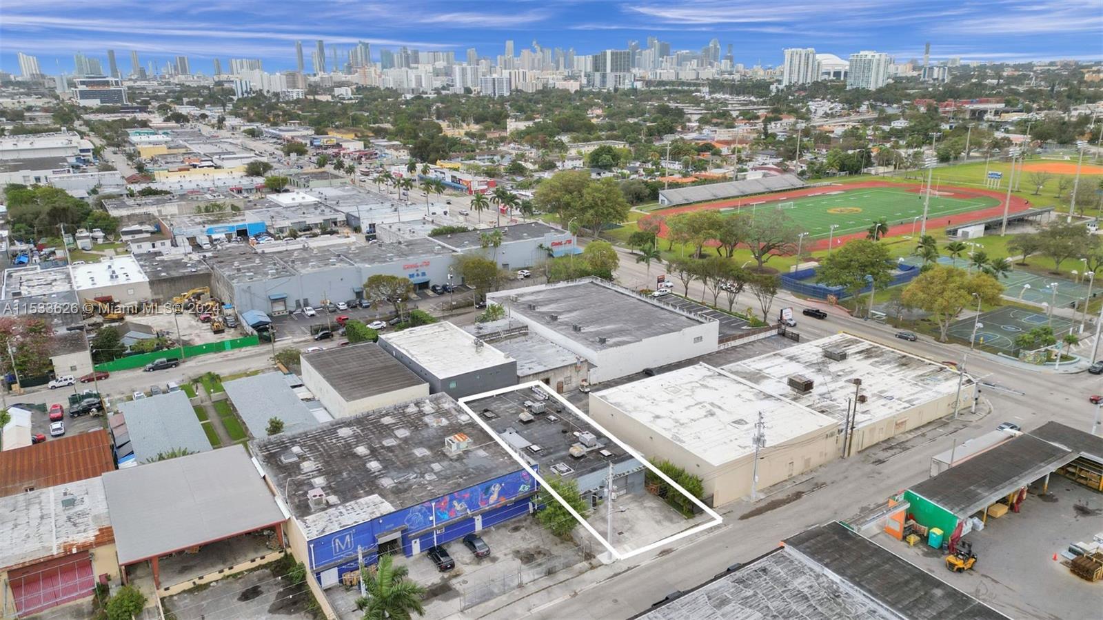 Completely remodeled freestanding warehouse in the Garment District near the Miami River. This 5000 sqft space serves as warehouse/retail/office, featuring a reception that opens to 6 private offices with glass enclosures for privacy. It includes a full kitchen, 2 large ADA-compliant bathrooms, new roof, and full A/C coverage. Office space totals approx. 800 sqft, and warehouse space about 4200 sqft. Equipped with impact windows/doors, advanced security with cameras, 18+ ft ceiling height, a white screen area for content creation, an employee lounge, 12 parking spaces plus ample street parking, proximity to MIA, Port of MIA, Wynwood, and Brickell enhances its investment appeal. Also available for lease; contact L/A.
