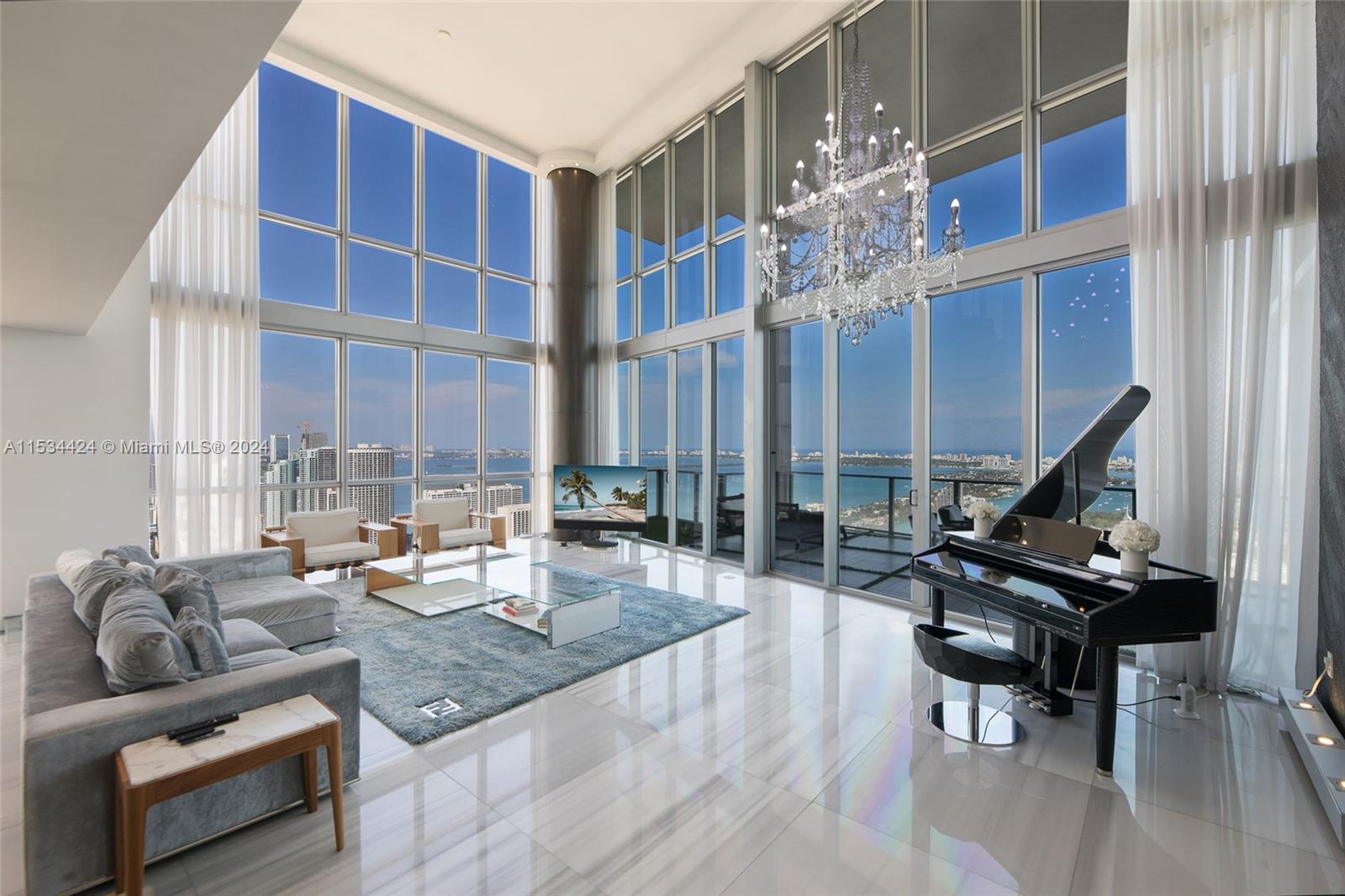 Welcome to your dream Downtown unit in the sky at the stunning Marquis building. This one-of-a-kind unit is actually three units combined into one (5306,5305,5304), comprising 5 bedrooms, 6 bathrooms, and 2 half bathrooms, all spanning just under 7,000 sq ft.
Step into luxury with a private dry sauna in the master bathroom, a theater room, and a bonus work area/office room upstairs. Enjoy breathtaking panoramic views of Downtown Miami, Miami Beach, and Brickell Key from every angle.
This unit also includes 4 assigned parking spaces. Centrally located, you'll be just minutes away from sports and cultural venues, entertainment options, dining hotspots, and shopping destinations. Take advantage of the 5-star amenities offered by the Marquis building, completing this unparalleled offering.