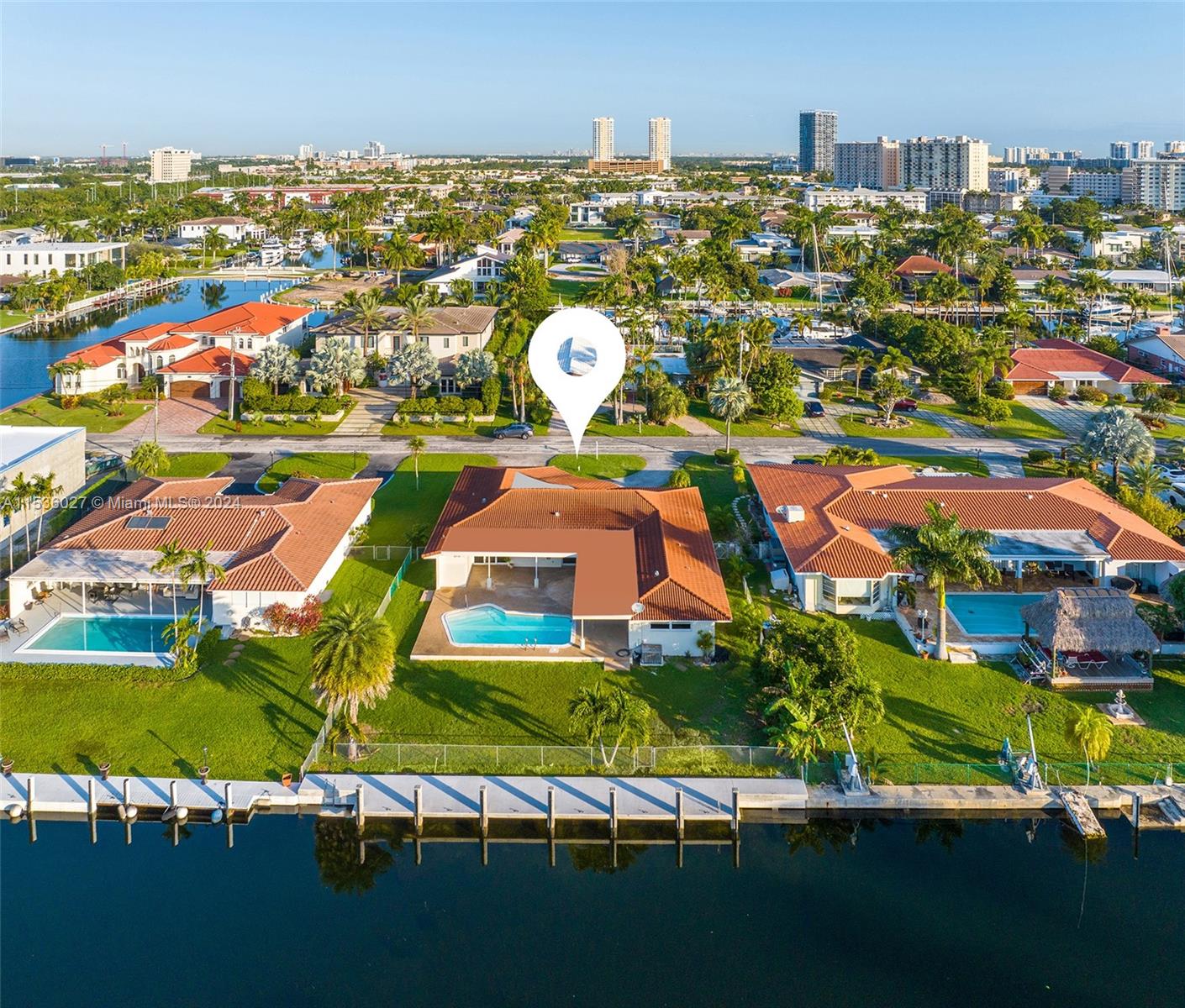 Golden Isles waterfront property with 83’ of water frontage and seawall / dockage on a 12,450 sq. ft. lot. This property has southern exposure on deep water, no fixed bridge with ocean access and has a new ($100K) batter pile seawall and concrete dock, not wood which has been raised over 2 feet preparing for a newly constructed estate. This 3 bedroom, 3 baths house can easily be rented while the new owners are designing and obtaining permits to build their new waterfront estate, as this process could take up to one year. Golden Isles is a boater’s paradise due its’ wide canals with turning basin along with its location between both Miami and Fort Lauderdale.  Also, Golden Isles has started its new vision plan to take this community to a next level, see the attachments.