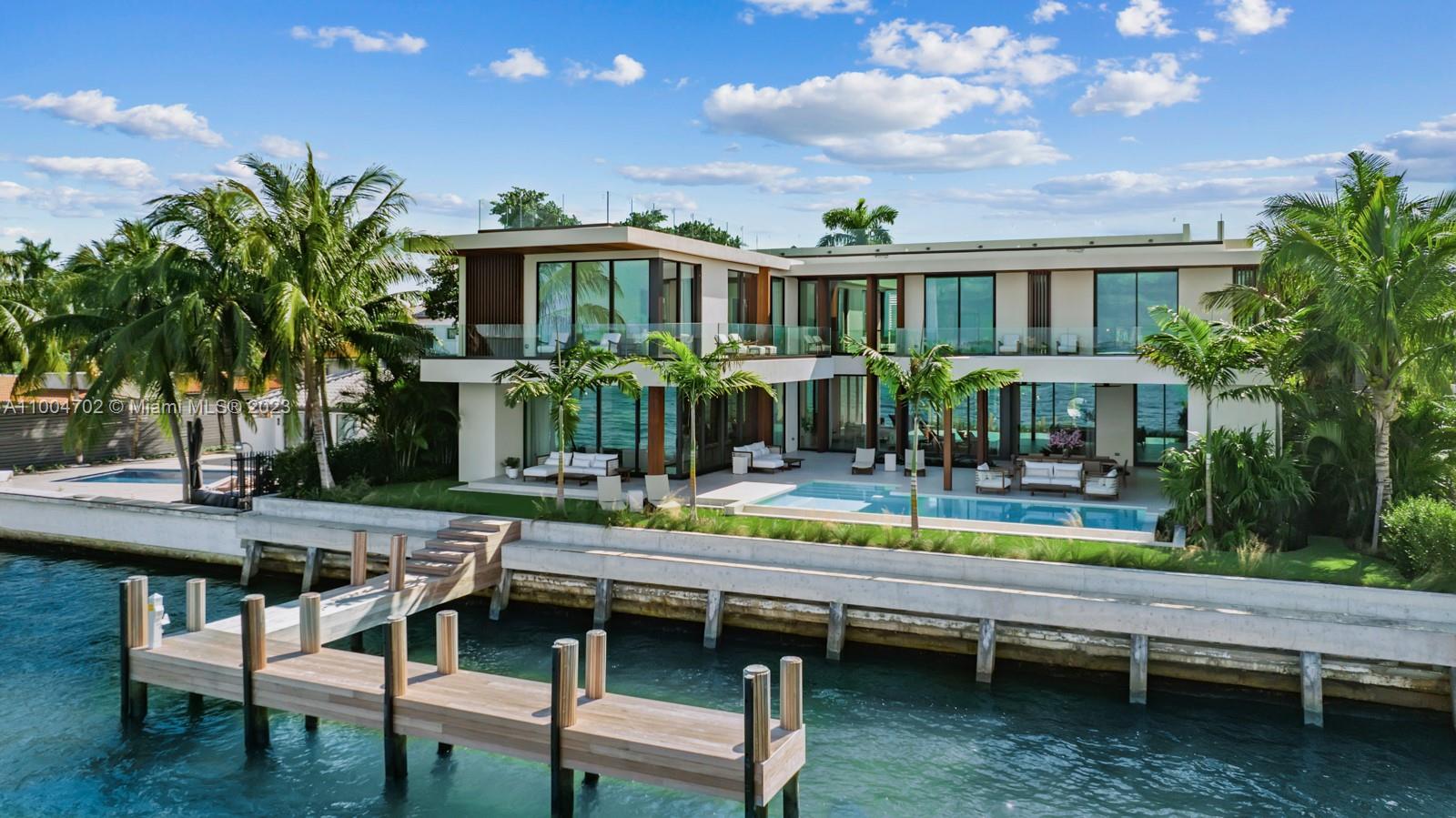Stunning new construction modern waterfront home situated on oversized 15,000 SQ FT with over 100 feet of waterfront. Enjoy wide bay views of mesmerizing sunsets, sea breezes, and the beautiful Miami Edgewater skyline! Located on the coveted Venetian Islands, this stunning 7 Bed / 8 Bath home was designed by Max Strang. Amenities include theatre, den, spacious outdoor living space with covered cabana, large roof terrace with 360-degree views of Miami, and more! Perfectly situated between Downtown Miami and Miami Beach, high-end restaurants, and shopping.