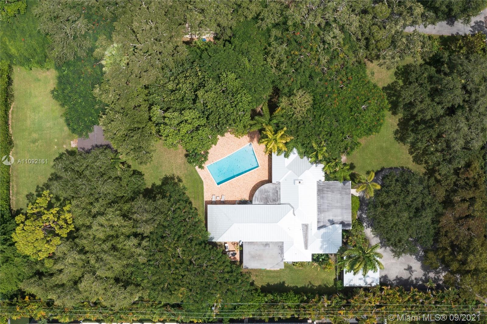 Don’t miss this rare opportunity to build or expand on a deep 1.14 acre lot in prime Northeast Pinecrest where homes currently for sale on similar lots average over $9 million. Walking distance to Gulliver Prep and just minutes from Beth Am, Our Lady of Lourdes Academy, St Thomas, Pinecrest Elementary, and great shopping and restaurants in South Miami and Dadeland. A similar property across the street recently sold for $3.2 million in just 17 days, and the least expensive home currently for sale in Northeast Pinecrest on 3/4 of an acre or more is $4.95 million so don’t miss this chance to own over an acre in one of the most exclusive neighborhoods in Miami.
