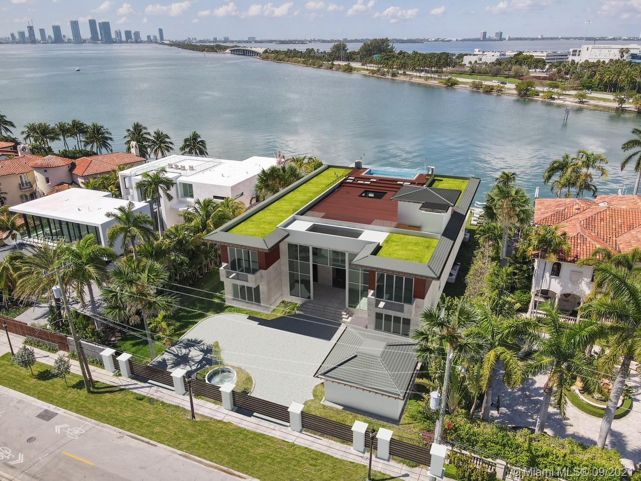 Rare opportunity to own your dream home on prestigious North Bay Road.  Price reflects the lot, building permits, architectural plans and shell of the home. This extraordinary waterfront property offers a stunning panoramic view of downtown Miami. Enjoy unobstructed ocean access and 100 feet of water frontage while boasting an expansive 11,649 of luxurious living space designed by award winning architect to uniquely capture the essence of all the elements.  Images displayed are only reflecting the visualization of the architectural plans (as per existing building permit).  Finishing touches can still be individually adapted to your desires. We are happy to discuss all details with you and project details are available upon request.  Prince is non-negotiable.