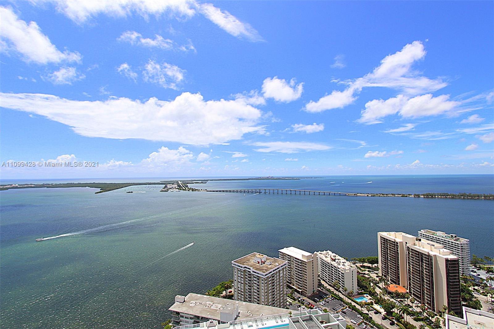 Sweeping & unobstructed water views from this 43rd floor penthouse located in the Brickell House Condo! Built in 2014, this magnificent high rise offers high end amenities which include 2 pools, gym, spa and valet service. Double main entry way foyer leads you to an ample and open main living area with floor to ceiling glass throughout. Water views can be had from almost all areas of this unit. Split floor plan provides a well-appointed master suite including enormous walk-in closet, master bathroom with soaking tub, separate shower and double sink vanity. Maids quarter next to laundry area. Balcony spans the complete length of unit with access points from all rooms. This is a one of a kind unit not to be missed!
