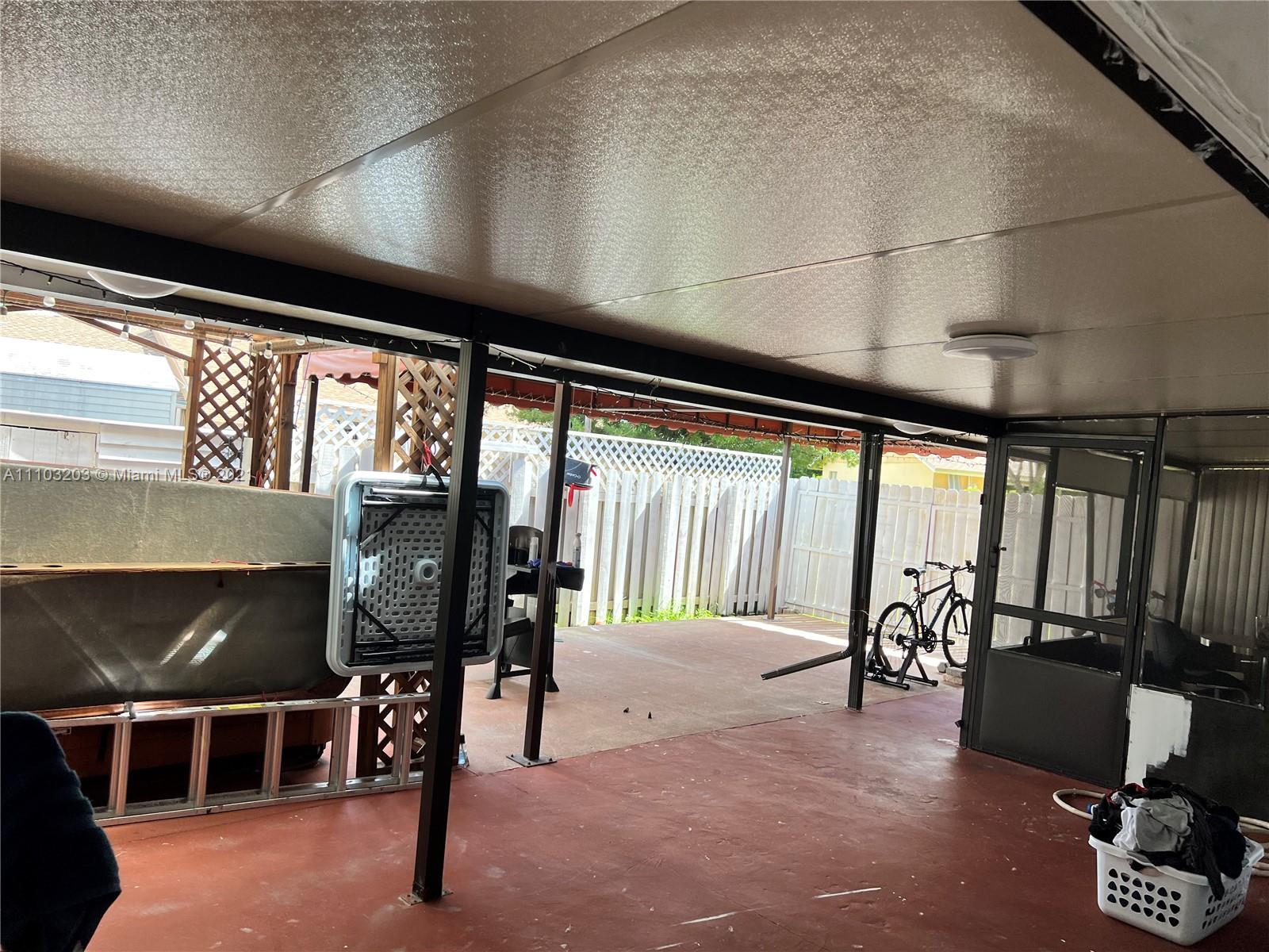 car size entrance through backyard.
