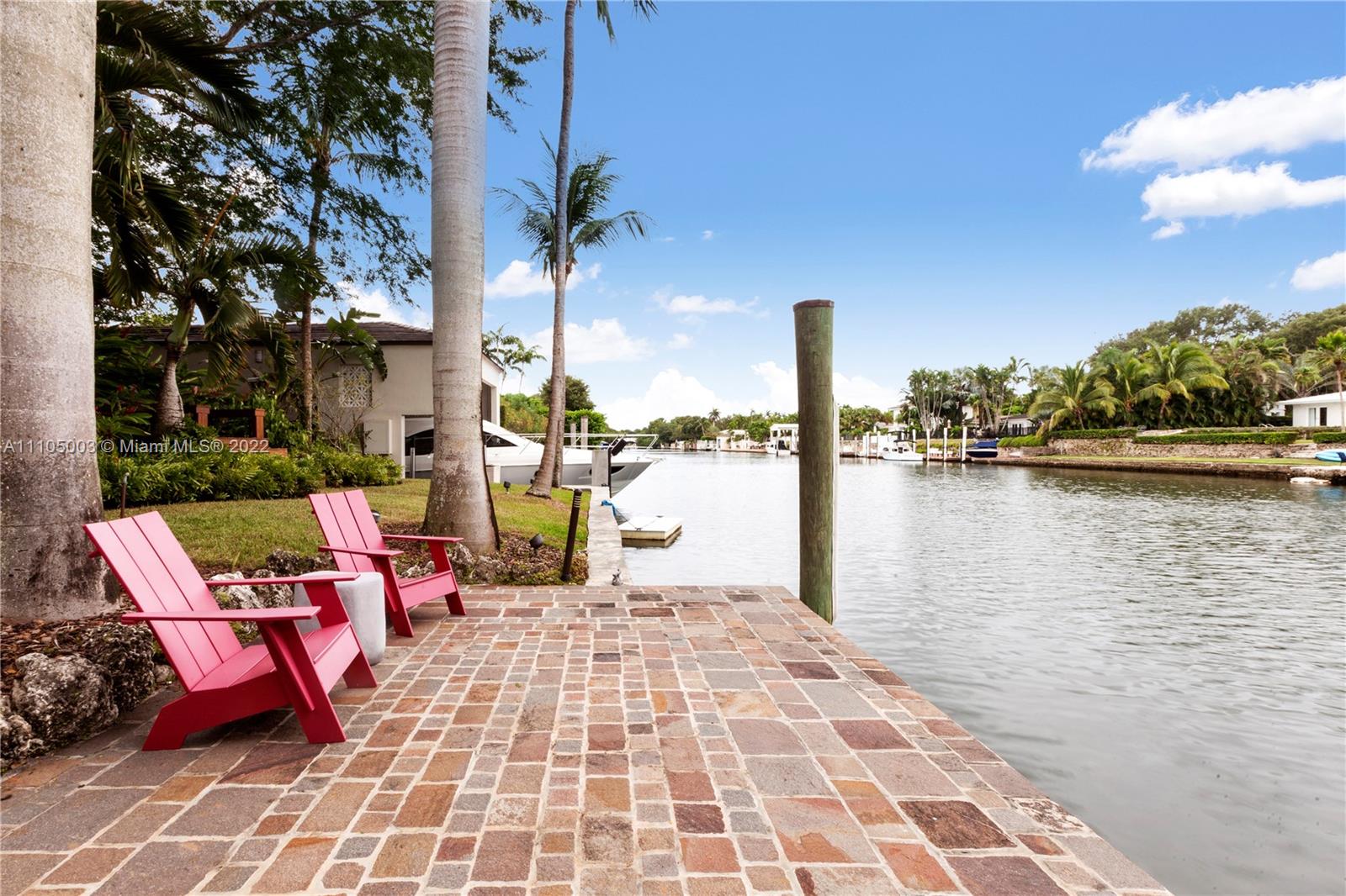 Extraordinary 137 ft. Waterfront family home in Coral Gables, perfect for boaters and water sport lovers, featuring a large Deck; Boat Slip and a unique Boathouse (aprox 500 sqft bonus area under AC media/gym room). This very spacious completely remodeled 5 BR 6.5BA and an office w/ private entrance is located on the widest part of the protected waterways east of US-1 on a gated 20,598 lot.  Meticulously designed to enjoy the incredible finishes throughout a very elegant floor plan. The abundance of light integrate both of the outside and inside living spaces. Close to shops, restaurants & top schools. Rare opportunity to own your private Resort and wake up every morning with gorgeous views of the water and lush gardens, and a chance to paddle boarding or jet skiing on your own backyard.