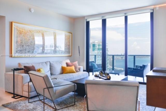 UNIT COMES WITH 1 PARKING SPACE AND FREE VALET. This designer furnished Unit features its own private elevator, 2 bedrooms, 3 bath + Den. Large balcony with a gorgeous Bay and Skyline view. This Unit has been completed upgraded and it is ready to move in. 1010 Brickell is located steps away from Brickell City Center & Mary Brickell Village.