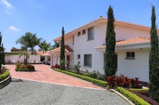The house of your Dreams in Colombia is sold fully furnished and with a beautiful view and ready to move in or for investments. 
Amenities: Pool, Jacuzzi, steamroom, spacious barbecue area basketball court, 3 storages, 2 covered car garage.
Automatic main door entrance
security 24/7 
California Style Home