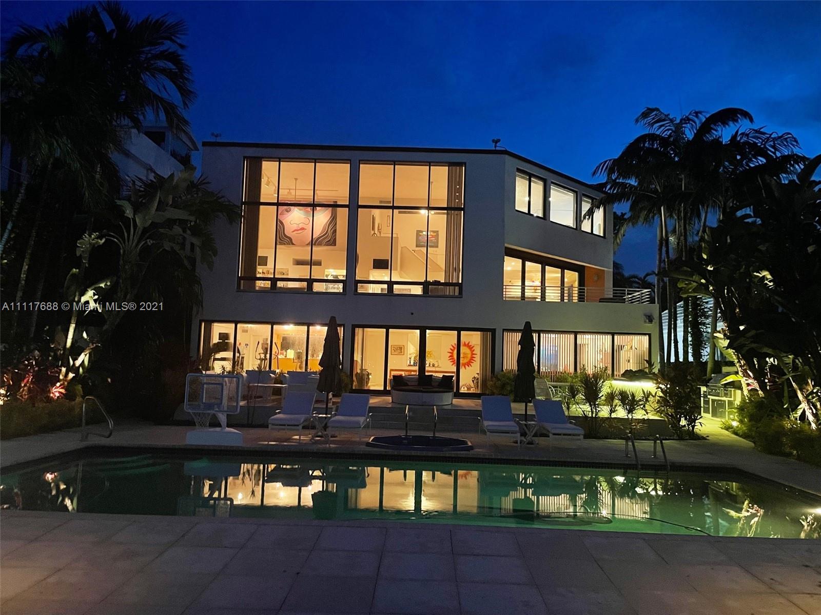 A dramatic custom built architect’s waterfront 3 story timeless custom gem featured on Miami Vice and in the Miami Herald. House features 35 foot skylight atrium, 33 ft. wide 2 story high living room with 15 foot high windows.5 bedroom, 5 1/2 bath overlooking the wide bay. A grand residence. Interested parties must be pre-qualified before showing. Showing is by appointment with 24 hour notice.