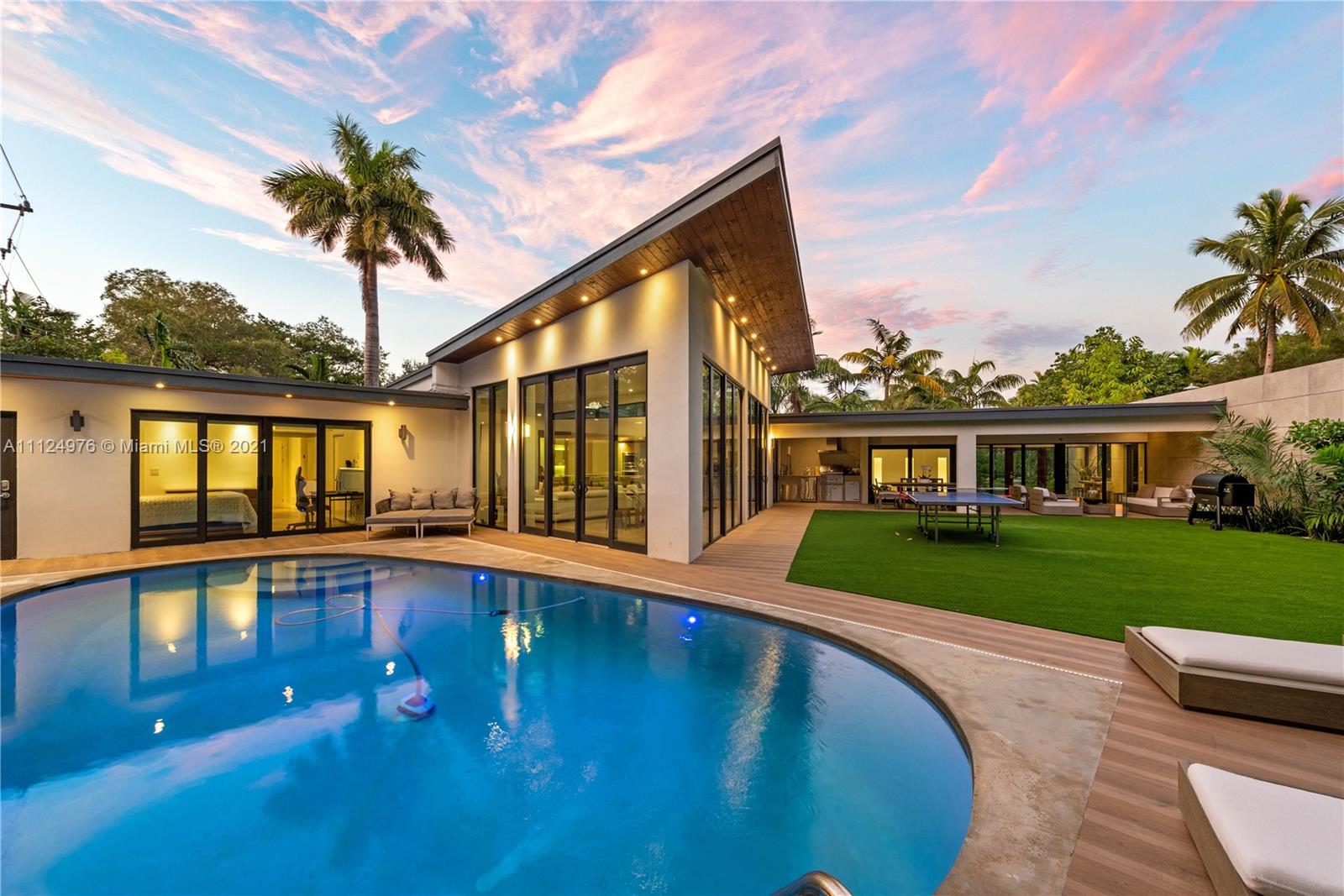 STUNNING MODERN COCONUT GROVE 4 BEDROOM BEAUTIFUL ONE STORY 2018 FULLY REMODELED HOME. SPECTACULAR OVERSIZED 12,750 LOT. HIGH-CEILINGS. GLASS WINDOWS AND DOORS EVERYWHERE. FULL OF NATURAL LIGHT. ONE OF A KIND GLASS GALLERIA THAT LEADS TO A BEAUTIFUL ITALIAN SCAVOLINI KITCHEN THAT OVERLOOKS TO THE LARGE GREEN PATIO AND BEAUTIFUL POOL. LARGE ISLAND W EXOTIC CALACATTA QUARTZ. THERMADOR APPLIANCES. GOURMET SUMMER KITCHEN. LARGE SOCIAL TERRACE & POOL AREA. SMART HOME. 2 CAR SEMI-ENCLOSED GARAGE. STORAGE SPACE. 24 HOURS OFF DUTY POLICE SECURITY. STEPS AWAY JUST WALKING DISTANCE TO VIZCAYA MUSEUM AND GARDENS, KENNEDY PARK, FRESH MARKET, GROVE MARINA AND THE BEST PRIVATE SCHOOLS