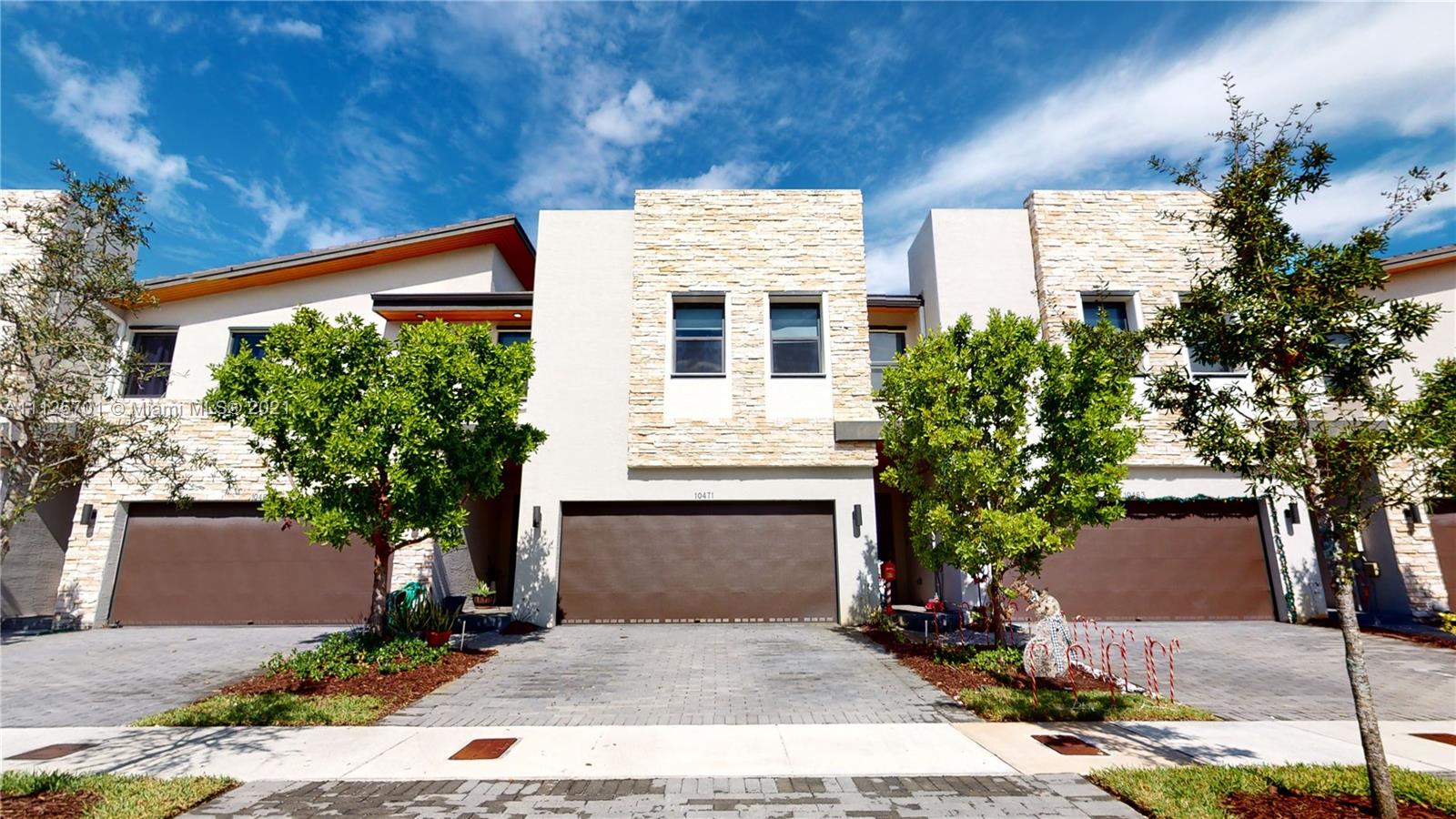 Beautiful Townhouse   in a quiet gated community, 4bed/3bath/1, title floor in the first level home, 2 Story, new kitchen with quartz countertop. Located in one of the best communities in Doral (Summit At Park Central), Ready for a family to enjoy.  High impact door and windows on the first floor. Only 3 years of construction. Owners leaving before closing. Amazing Club House, Gym, Pools, Bike Trails, Soccer Field, Tennis Court, Spectacular Restaurant, Security Patrol, Banquet Hall, and much more. Close to airports, Malls, Restaurants, recognized A+ Schools, and more.  This property will be ready to show from 11/22/2021 by appointment. Appointments ONLY, 24 HOURS IN ADVANCE,!!!!!!! SHOWING ASSIST.