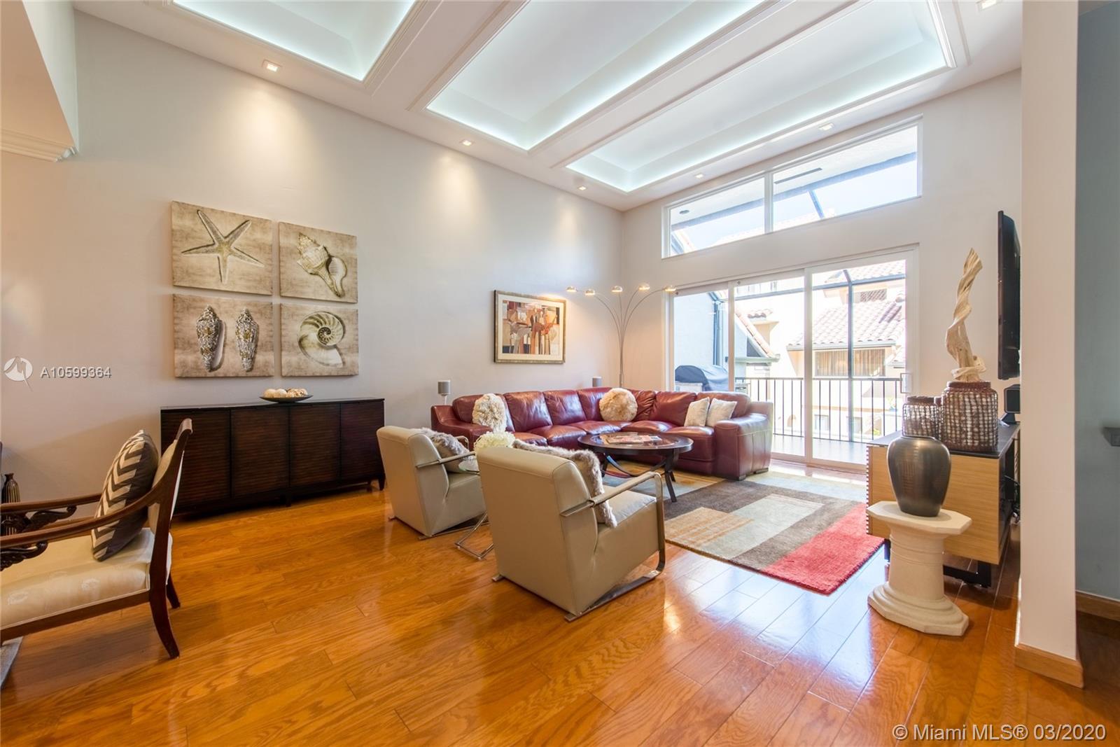 This beautiful, renovated 4BR/4BA villa in L&#x2019;Hermitage offers convenient Grove living at its finest! Main level entry opens to eat-in kitchen with top-of-the-line appliances, dining room, living room with back-lit coffered ceiling, den & full bath. Expansive outdoor north-facing screened-in porch (607 SF, per Developer drawings) with Lion grill, refrigerator & TV. 1st level includes 1BR/1BA + office/multi-purpose area with ample storage/laundry. 2-car garage & 2-car carport. The 3rd level features a spacious master suite and master bath with volume ceilings, Jacuzzi, walk-in closet, glass enclosed shower & dual sink vanity. Also 3rd & 4th bedrooms with guest bath. Impact windows/doors throughout. Community pool, tennis courts & docks. Schools, parks, and Downtown Miami within minutes away!