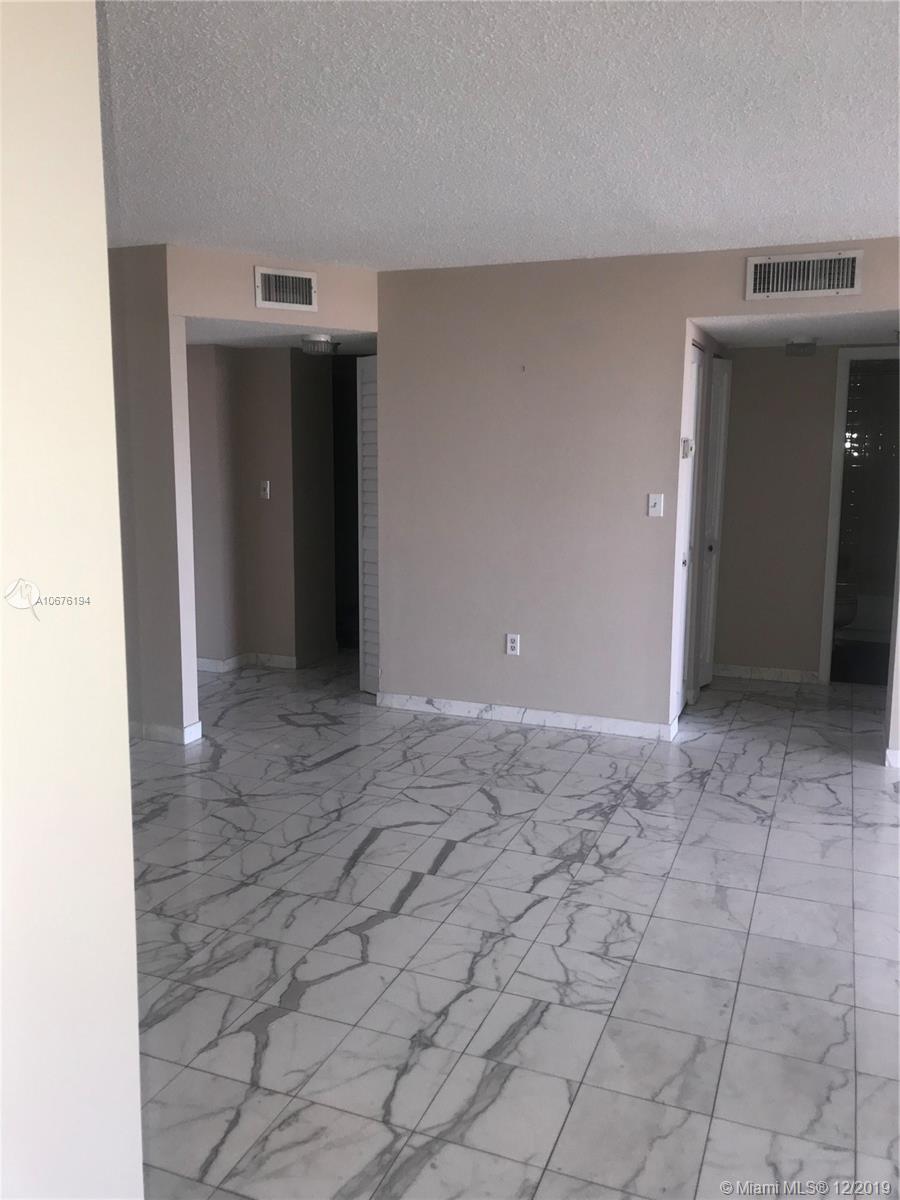 Miami, FL 33179,900 NE 195 ST #704