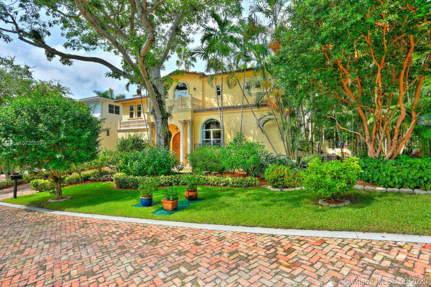 Live in &#x201C;Treasure Trove&#x201D;, an exclusive gated community of only 10 homes just steps from Biscayne Bay. Walk to the Grove village center&#x2019;s galleries, boutiques, cafes and bayfront parks & marinas. Stunning European-style villa with light-filled living spaces, dramatic double-height ceilings and the finest fixtures & finishes throughout. Elegant formal living & dining rooms with expansive windows that overlook lush greenery & the tree canopy. Custom kitchen features wood cabinetry, wine refrigeration, gas range and center island w/ bar seating. Luxurious master suite & marble bath w/ soaking tub & frameless glass shower.  Large family room features built-in cabinetry and floor-to-ceiling glass overlooking the spectacular garden with footbridge & winding pathways surrounding the tropical pool.