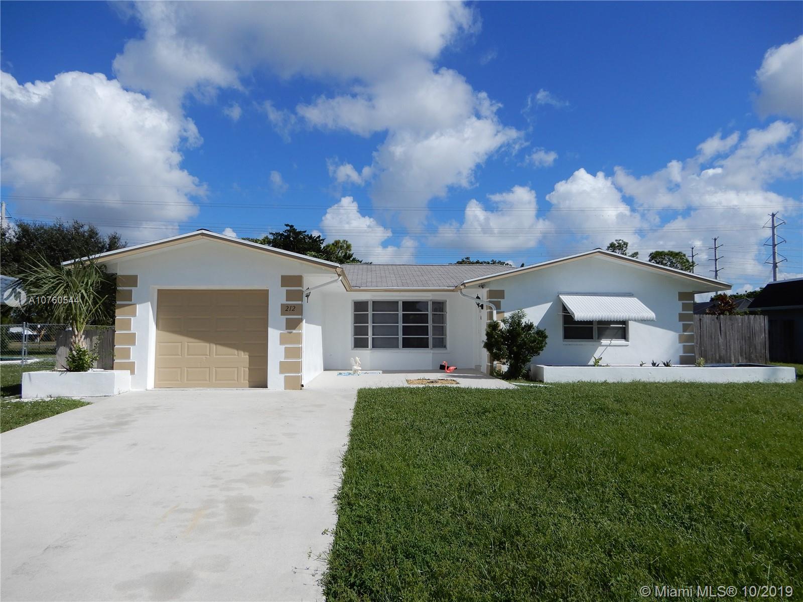 212 Sandpiper Ave, Royal Palm Beach, FL 33411