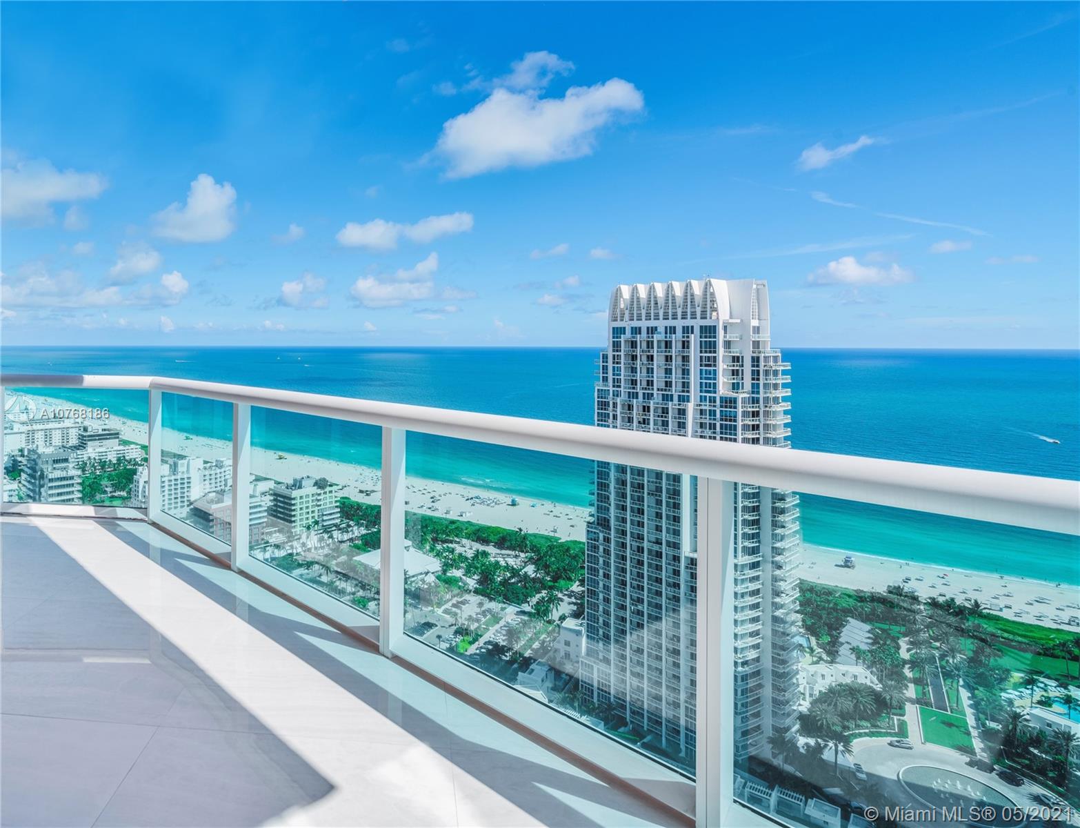 This extraordinary, contemporary-style smart home in the sky is an innovative work of art. This custom designed unit is brand new & fully furnished by iconic Italian luxury brand Visionnaire. Comprised of 2 units meticulously combined to form one impeccable 4,800 sf residence with breathtaking ocean, bay, Miami skyline & sunrise & sunset views. Features include, a flow-through layout, white onyx gloss floors, Vegan stingray leather finishes on the doors & walls, marble bathrooms, Manooi chandeliers, wet bar w/ Rolls Royce style ceiling lighting, Crestron controls & security camera’s throughout, gourmet kitchen w/ Miele & Viking appliances & a principal suite fit for royalty with a custom Pink Quartz closet, floating tub overlooking the water, retractable projector & 180 degree views