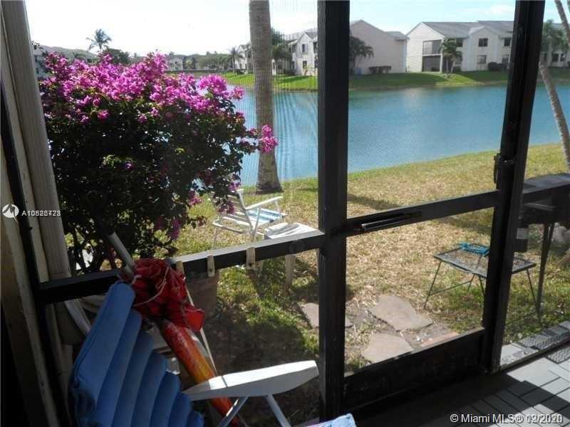 FULLY FURNISHED LAKEFRONT 1ST FLOOR 2 BEDROOM 1.5 BATH CONDO. Condo is all tile, screened patio overlooking the lake, 24/7 gated community, 2 community pools and clubhouse.