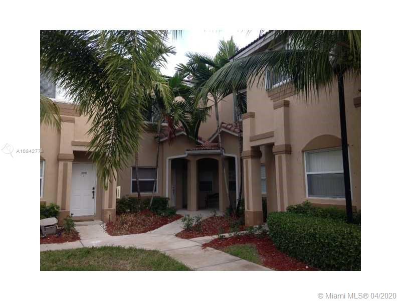 FRESHLY PAINTED AND CLEAN TOWN HOME WITH NEW TILE IN LIVING AREAS, LAMINATE IN BEDROOMS, LAUNDRY UPSTAIRS & FENCED BACKYARD. HOA INCLUDES ATT UVERSE CABLE & INETRNET, ALARM,  SECURITY PATROL, BUILDING INS, ROOF, EXT PAINT, GATED ENTRANCE AND COMM POOL