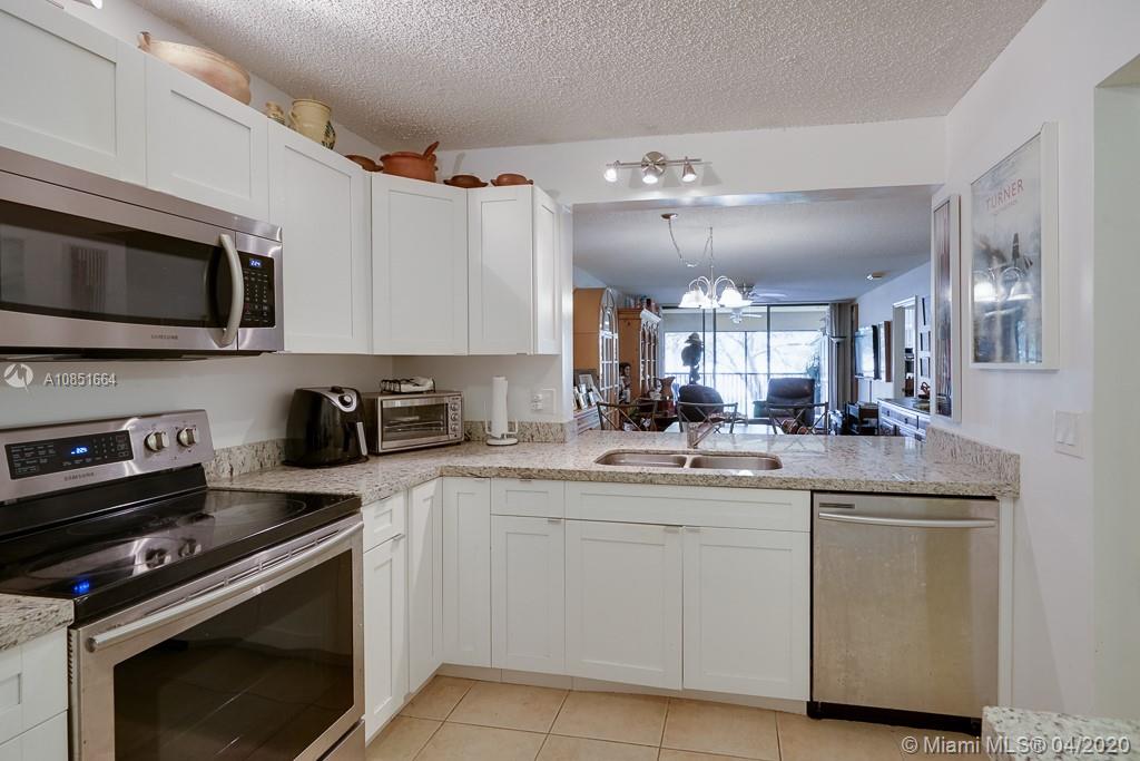 8592 W Sunrise Blvd #205, Plantation, FL 33322