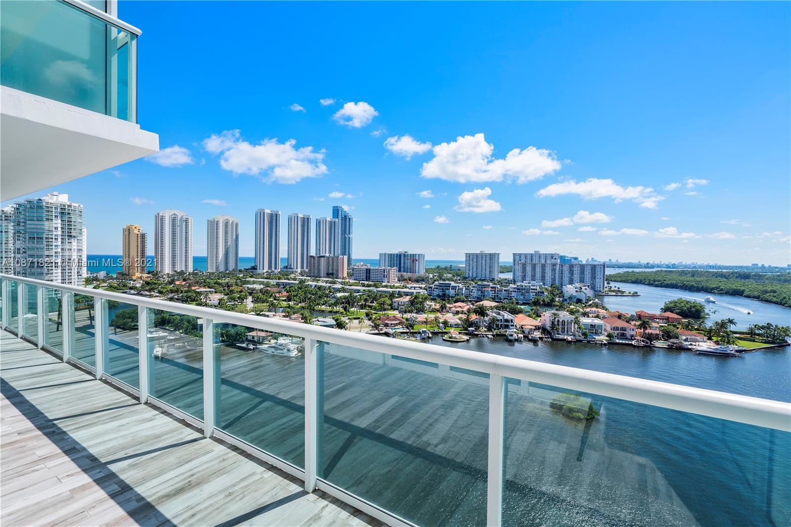 AMAZING NEW OPPORTUNITY AT 400 SUNNY ISLES! Very saw after split floor plan, with large balcony exposing stunning panoramic Intracoastal views with Sunny Isles Skyscrapers bordering the sky on the left and Oleta National Park on the right, gorgeous to relax and enjoy. This luxury 3 Bedrooms/3 Baths condo unit, fully furnished by Crate & Barrel, features a Master Suite with a very large walk-in closet. The living room features lots of natural light. Full-Service building, 24hrs front desk, gym, Tennis court, Pool, Marina, Valet. Walking distance to Sunny Isles Beach, near Aventura Mall, Bal Harbour Mall, schools, and world-class restaurants. Featuring resort-style pool deck with full-service private Marina and boat with wet and dry slips, to all residents. Seller motivated.