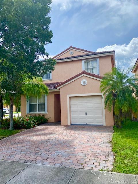 Perfect starter home! Corner home, 3/2.5 with 1 car garage in the lovely Shores gated community. Home features a spacious open floor plan, tile on 1st floor, accordian shutters and great sized yard for entertaining.