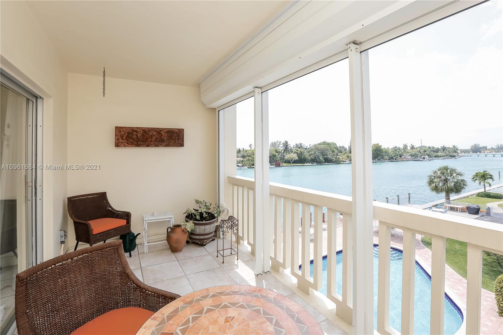 Spectacular waterfront corner unit with over 1700 sq ft of living space overlooking the iconic Indian Creek Waterway and Bridge. This perfect bayfront home features beautifully updated marble baths, electric hurricane shutters, large kitchen and grand living spaces. Enjoy water views from every window and amazing sunrises. Building amenities include heated pool, gym, private parking and oversized climate control storage. HOA includes high speed internet and cable. Located within walking distance to beaches, Bal Harbour Shops, fine dining, houses of worship and top rated K-8 school. NO LONGER 55+ COMMUNITY. NO AGE RESTRICTION.