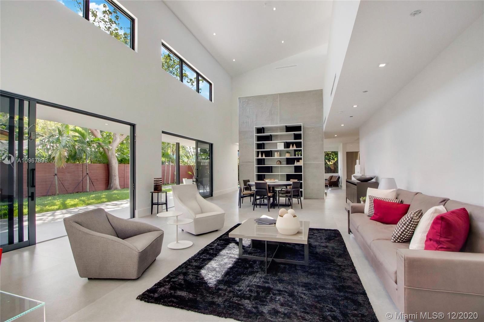 A Masterpiece 2020 Construction located in secluded North Coconut Grove subdivision Bay Heights. Enjoy magnificent double high ceilings with 5 spacious bedrooms and maid's quarter. This residence showcases contemporary design and luxury details. Superb layout for the comfort of the family, privacy and entertainment featuring 6 bath, walk in closets, family room,terrace corridor, pool, Porcelanosa flooring, high end Italian kitchen equipped with Miele appliances. The Master bathroom features an additional exterior shower to indulge in the outdoor lifestyle. Lots of storage. Next to top ranked schools in Florida like Ramson everglades and Mast Academy with a Cambridge program. Super Location. Close all major highways, Key Biscayne, Brickell City Center, Beach, Parks, Coconut Grove shops.
