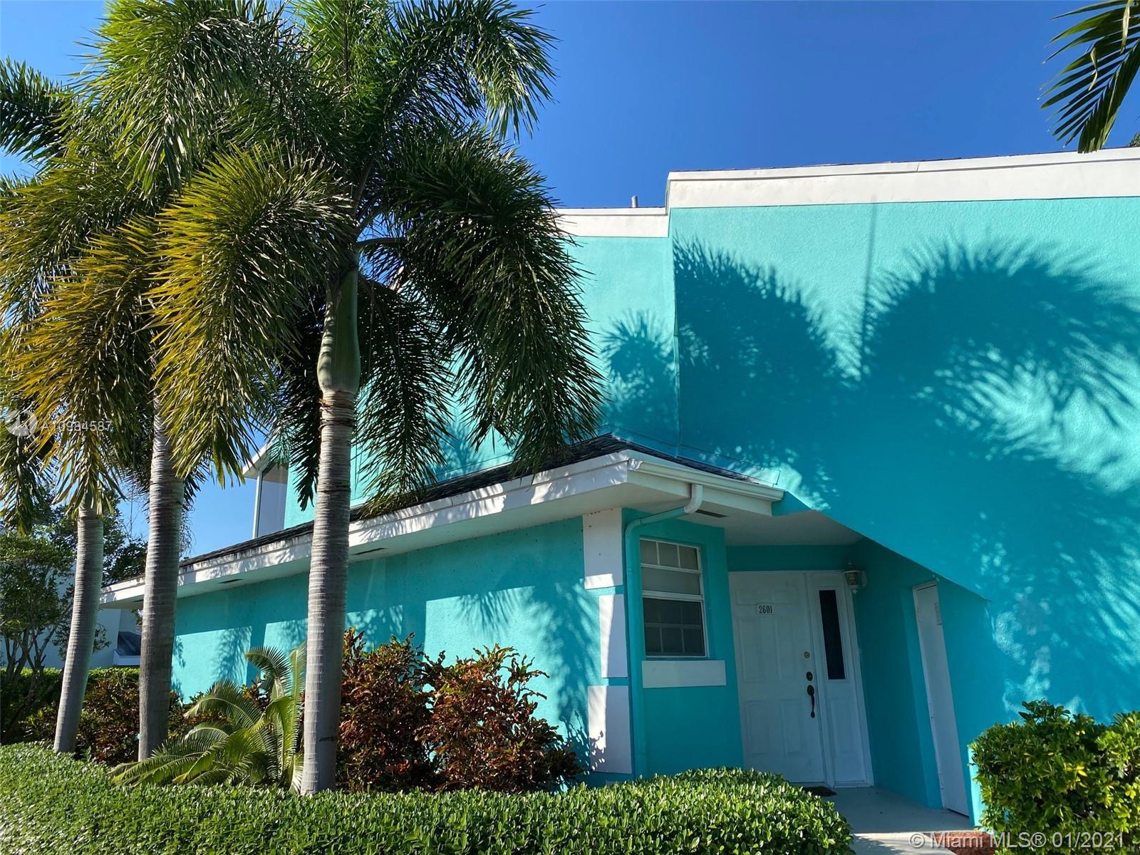 3 Bedroom First floor centergate unit - updated kitchen - pristine condition.  Ready for move-in. Pool, tennis and other amenities. HOA includes water,trash,  cable, security alarm. Insurance on bldg. Screened in patio.  Guard at entrance. Country club living in sought after Keys Gate. Easy to show - vacant -lockbox -show assist