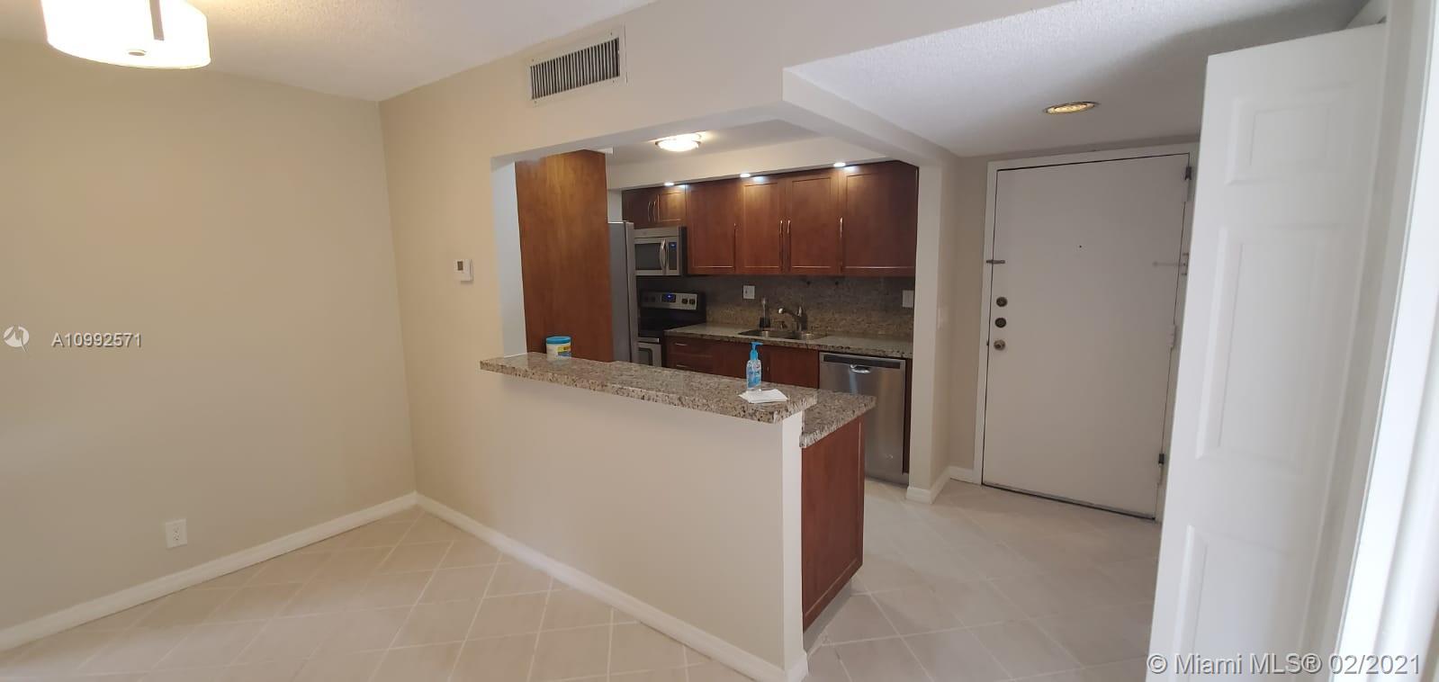 303 Racquet Club Rd #305, Weston, FL 33326