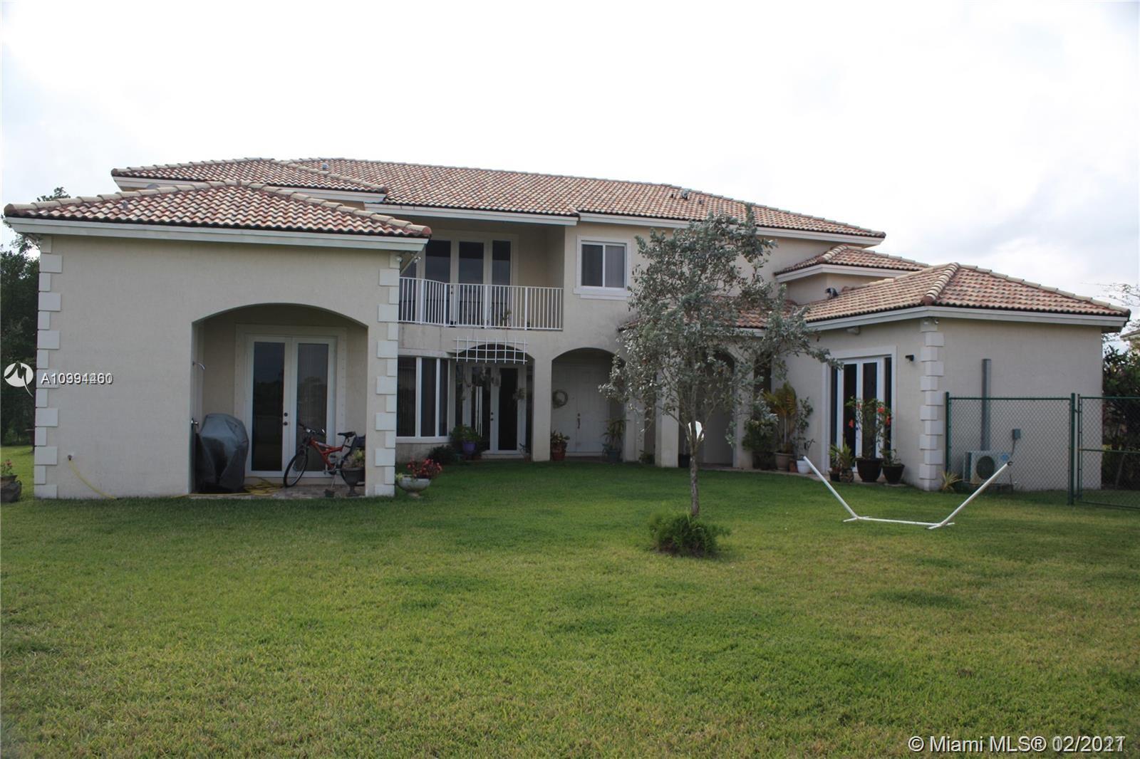 Beautiful 2 story home on large corner lot in the desirable gated community of Palm Isle Estates at Keys Gate!  This 5 bedroom 6 bath home features a separate in-laws quarters with full bedroom and bath, huge eat-in kitchen with granite counters, tiled first floor and carpet upstairs.  This beauty is on an oversized canal lot with a fenced in backyard.   Also has a courtyard area perfect for entertaining. Rent includes: 24 hour roving security,  AT&T cable and internet, alarm monitoring, tennis courts and more. Owner requires first and double security deposit, full credit reports and proof of employment, and association application fee for background checks.