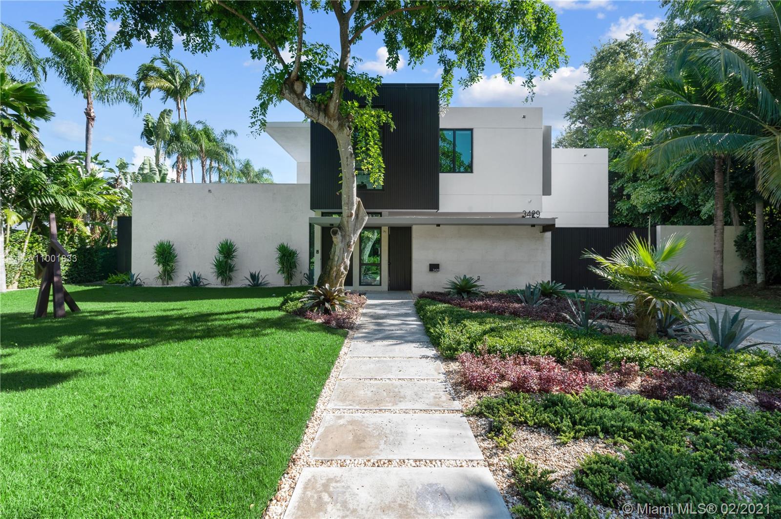 Welcome to the Moorings. This exquisite home was designed by Roney Mateu in a Modern Miami style. New 2019 construction offers effortless 21st-century luxury living & timeless sensibility. Every inch of its 5,936 SF is scaled to full advantage. Sky-high glass walls welcome natural light & frame the lush landscape & 63-ft pool w/waterfall. Marble and oak plank floors throughout. Ultimate Scavolini Italian kitchen w/Gaggenau appliances; sleek baths; full gym; staff suite. The private, gated Moorings enclave boasts 24-hr security & 3 parks within its intimate bayfront confines; from its coveted Main Hwy address walk or bike to top-tier schools, downtown Grove restaurants & shops.